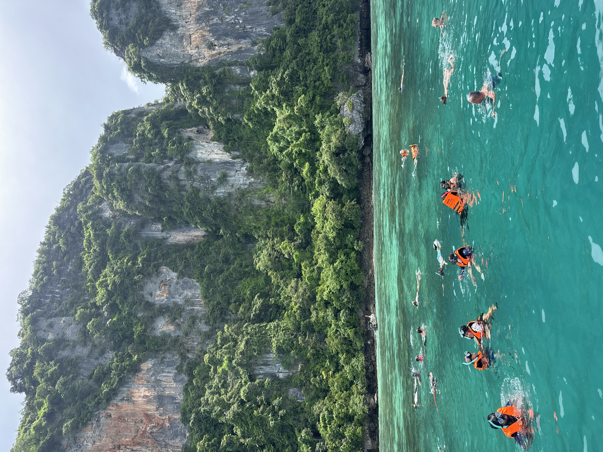 Boats and snorkelers among Ao Nang's limestone islands