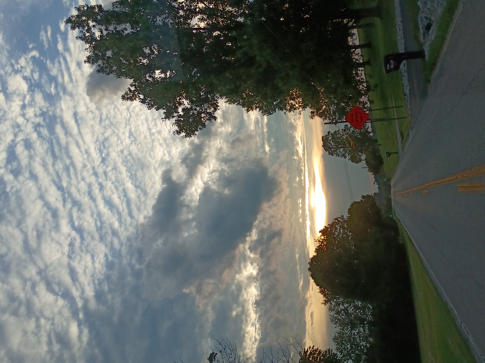 Warm sunset light over a quiet rural road in Kentucky