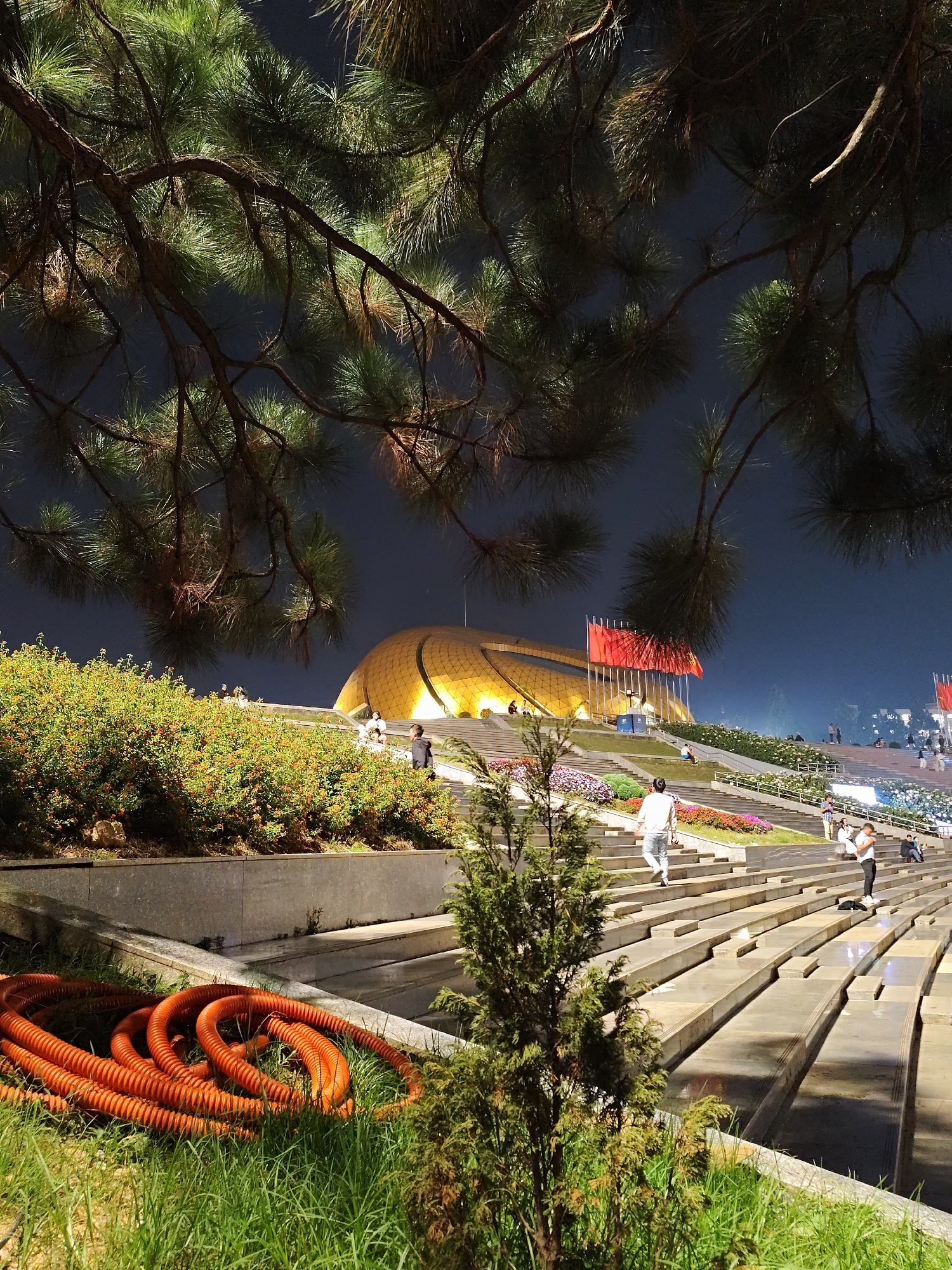 Nighttime scenes around illuminated Xuan Huong Lake in Da Lat