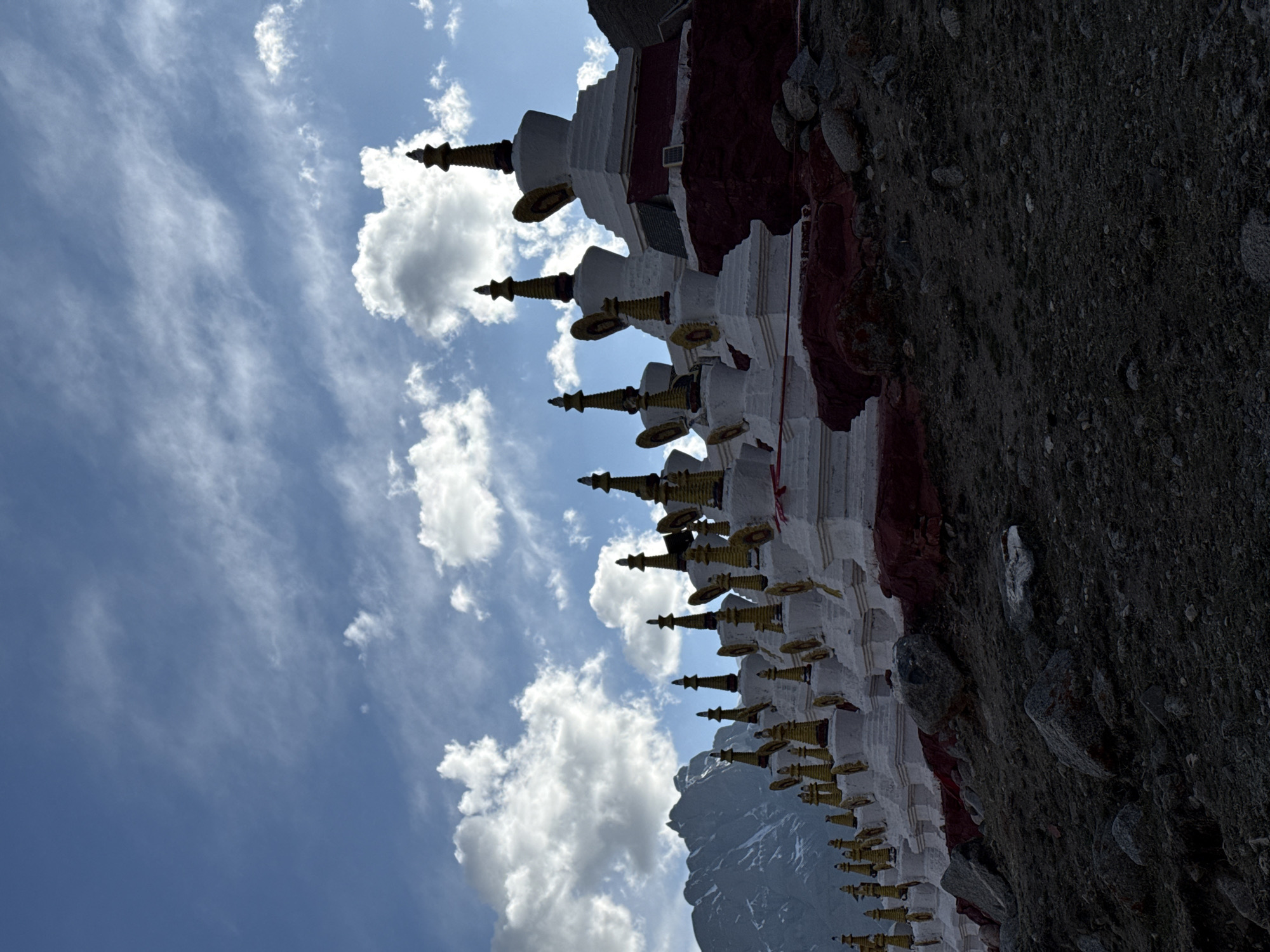 Buddhist stupas with golden spires documented in mountainous China
