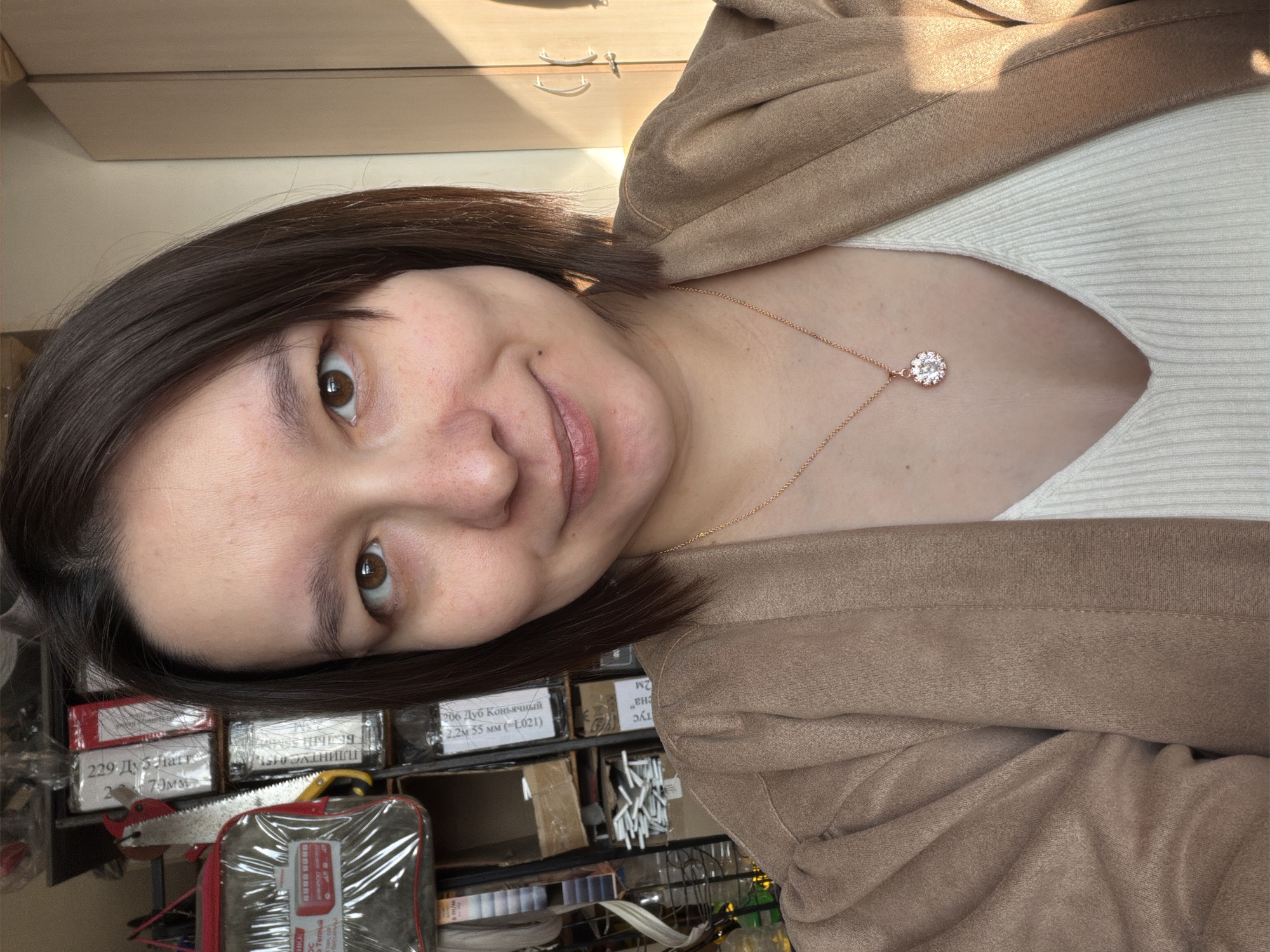 Woman takes selfie in indoor setting in Kozlovka