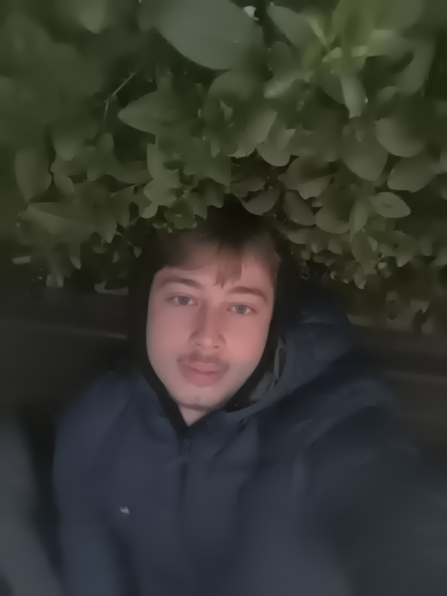 Young man captures casual selfies across Sofia locations