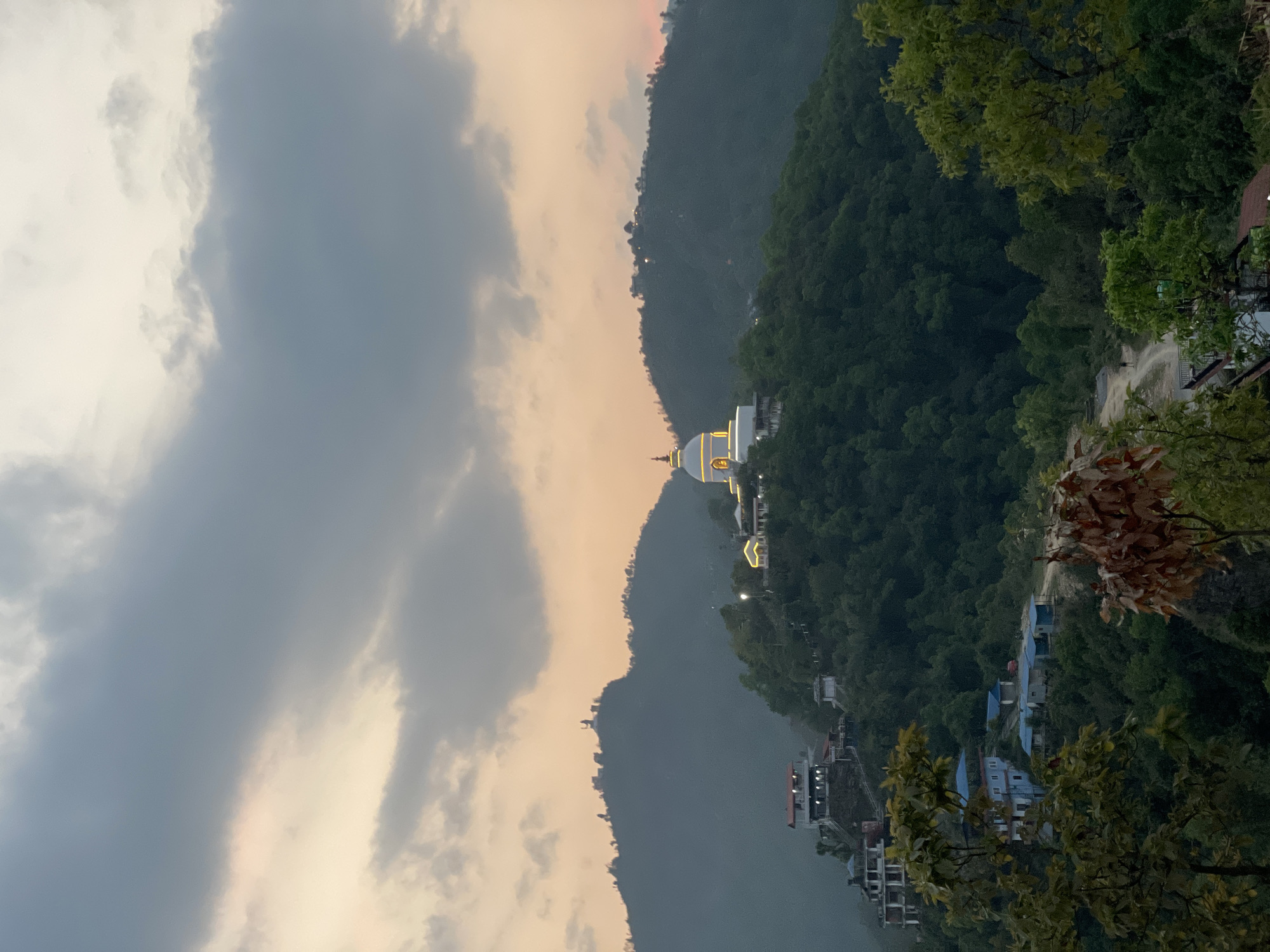 Religious stupa observed on hilltop overlooking Pokhara, Nepal