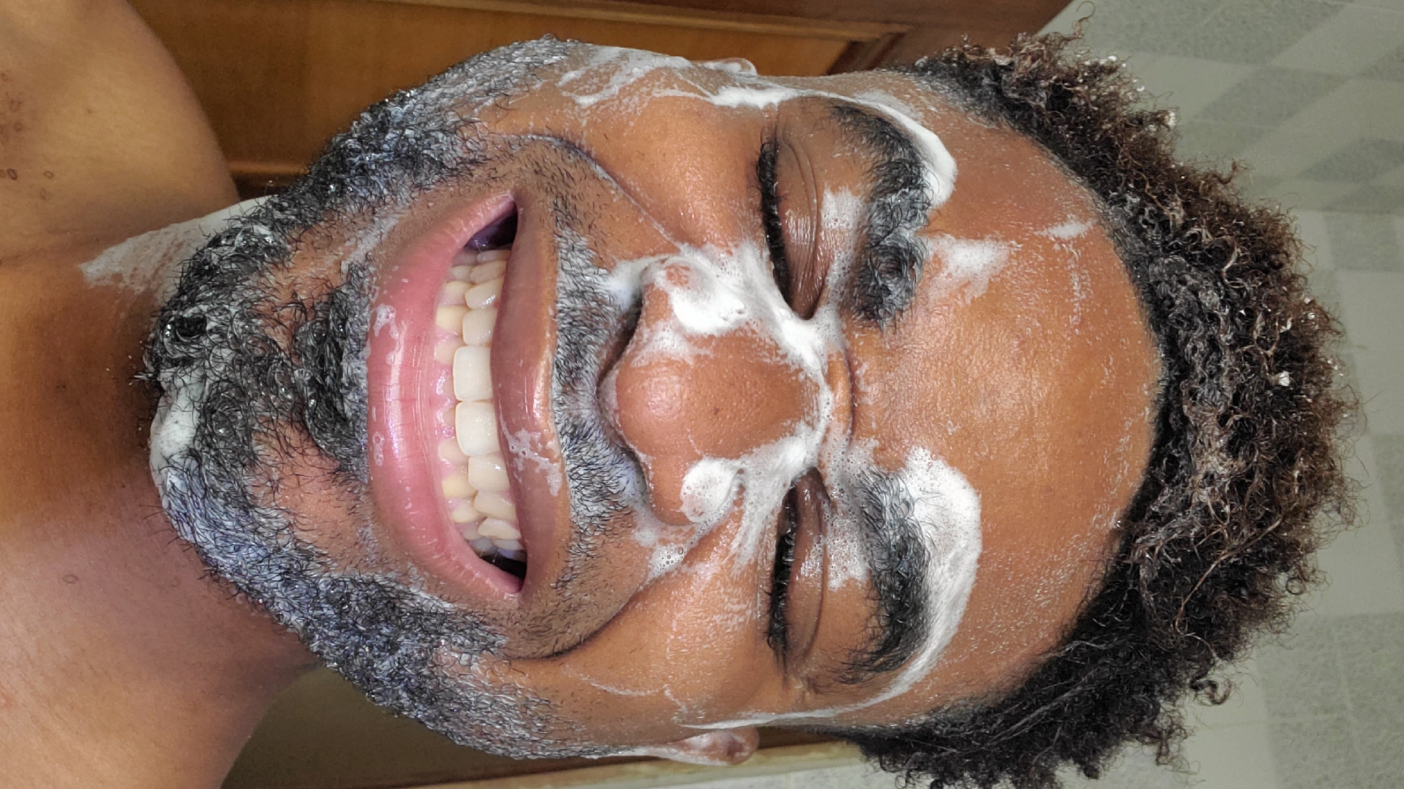 Man's morning hygiene routine documented in Obosi, Nigeria