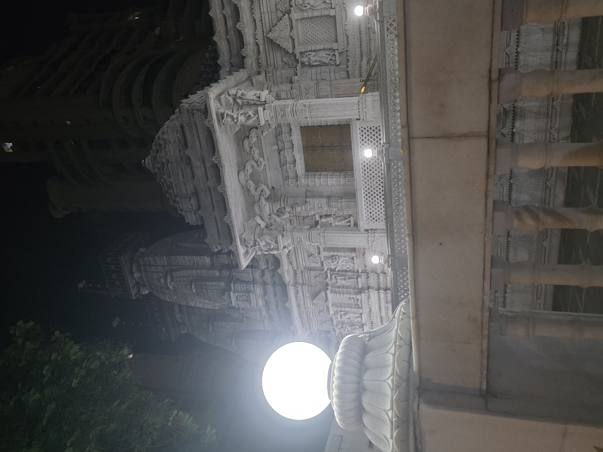 Mumbai's Akshardham Temple and neighboring residential towers at night