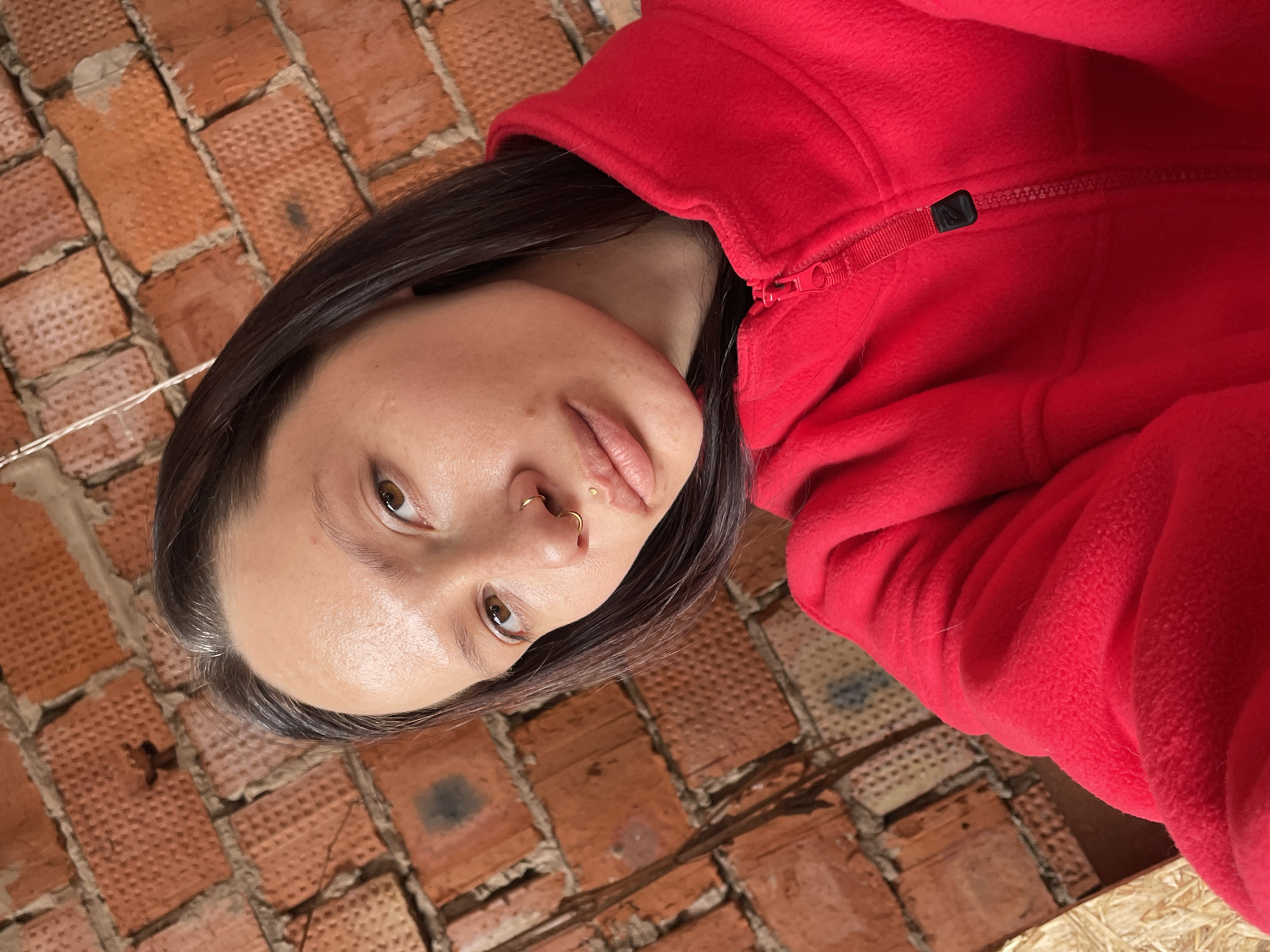 Photo session at decorated brick building in Oktyabr'skii