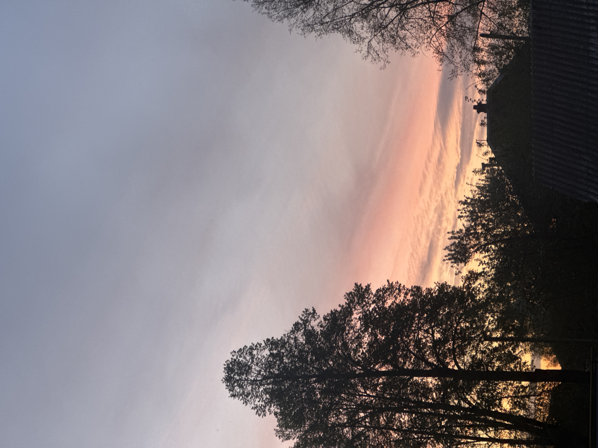 Sunset observed with pink-orange sky in Osa, Russia