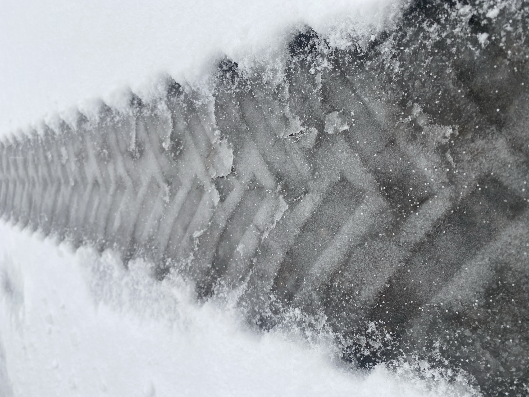 Snowy conditions documented in Prikamsky, Russia with damaged infrastructure