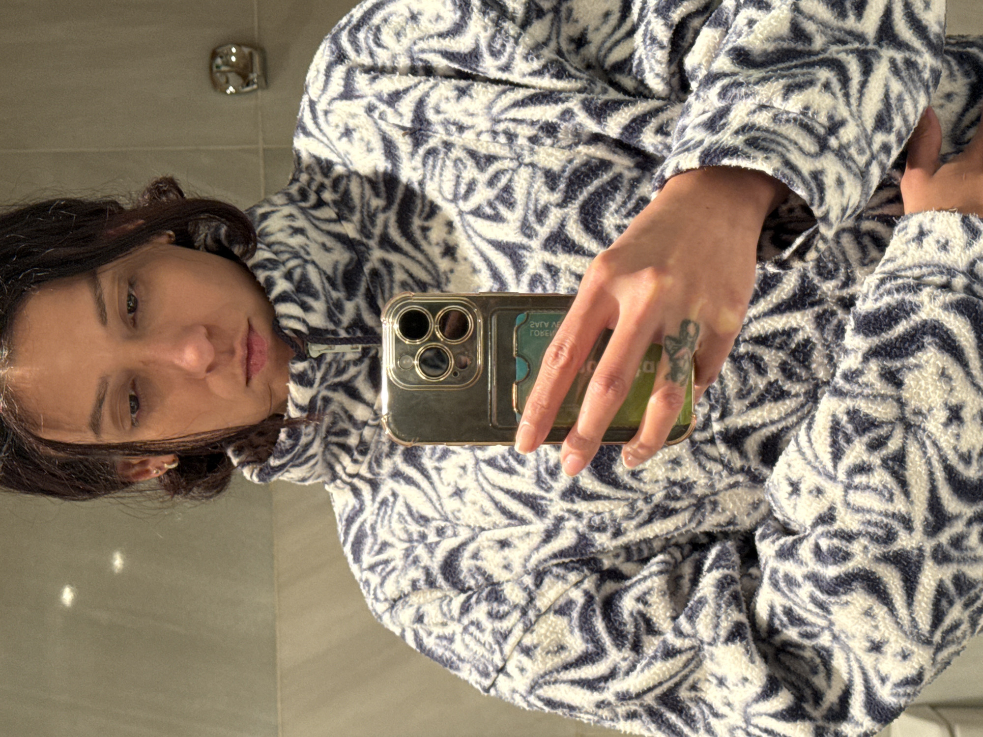 Woman takes bathroom selfie in Barcelona