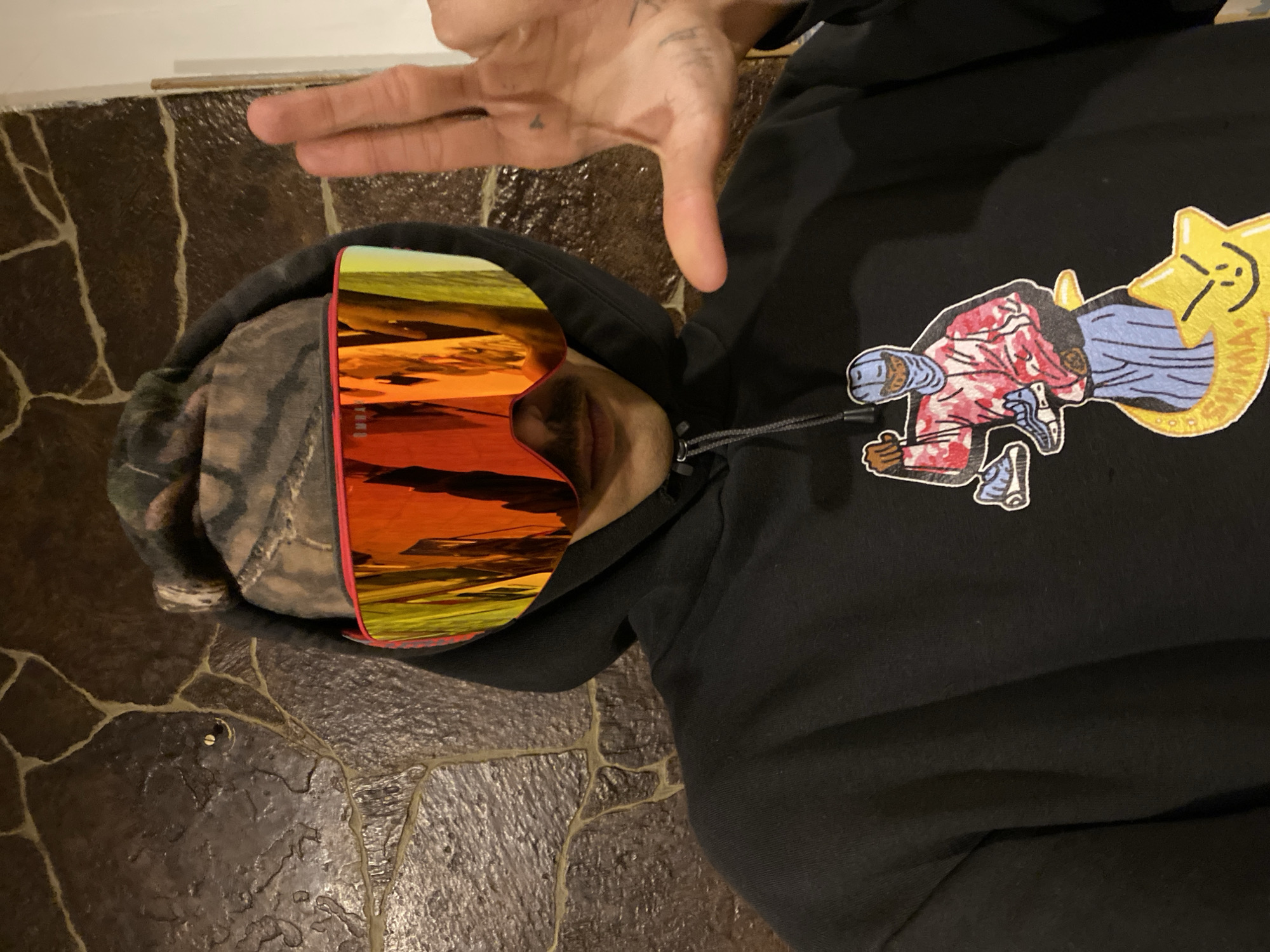 Person photographed indoors wearing distinctive clothing in Ushuaia, Argentina