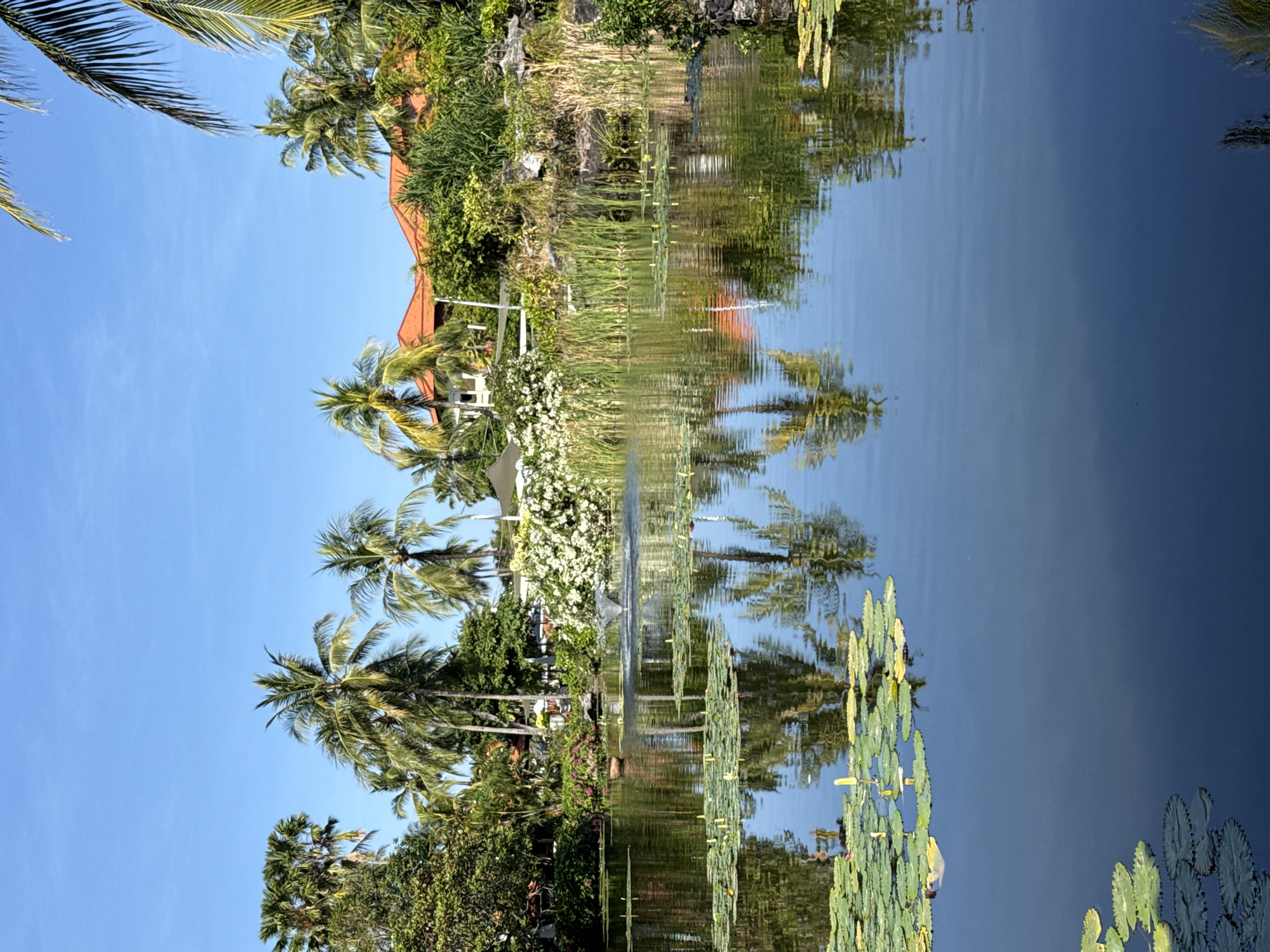 Tourist documents tropical resort grounds in Kuta Selatan, Indonesia