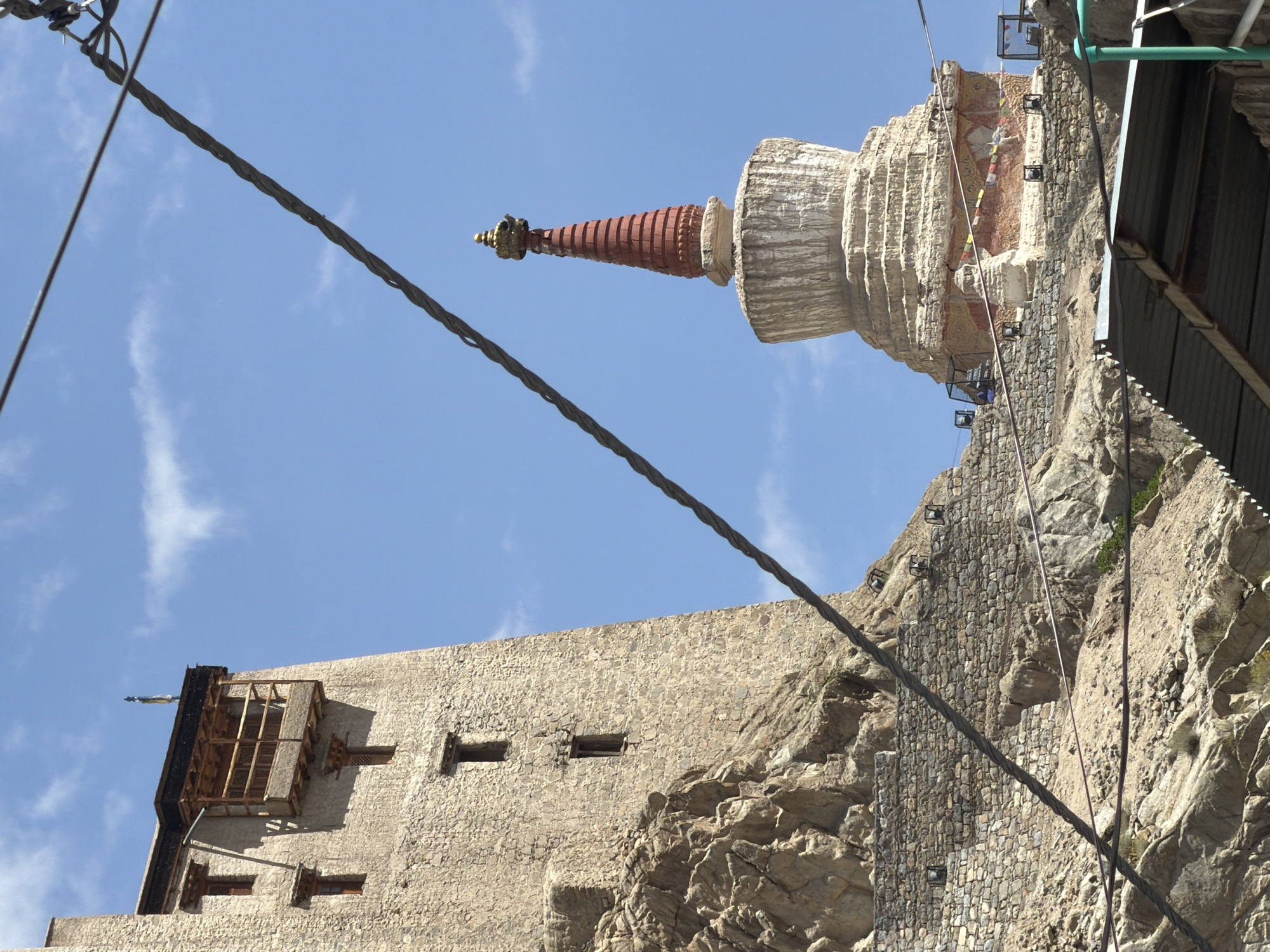 Leh Palace and hilltop fortress under a clear Ladakhi sky