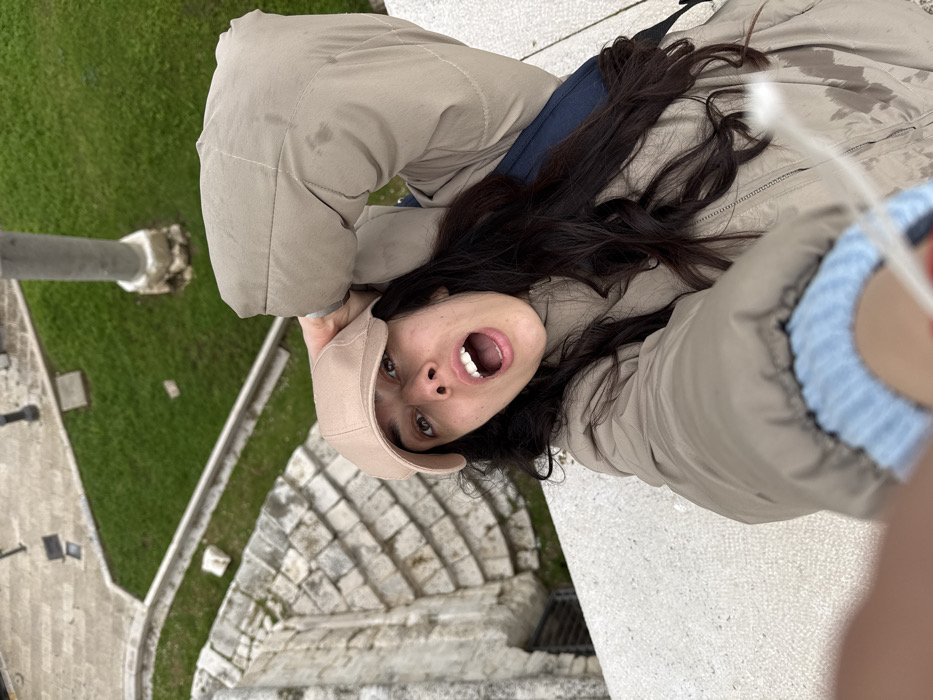 Tourist documents afternoon exploration of historic Bari, Italy landmarks