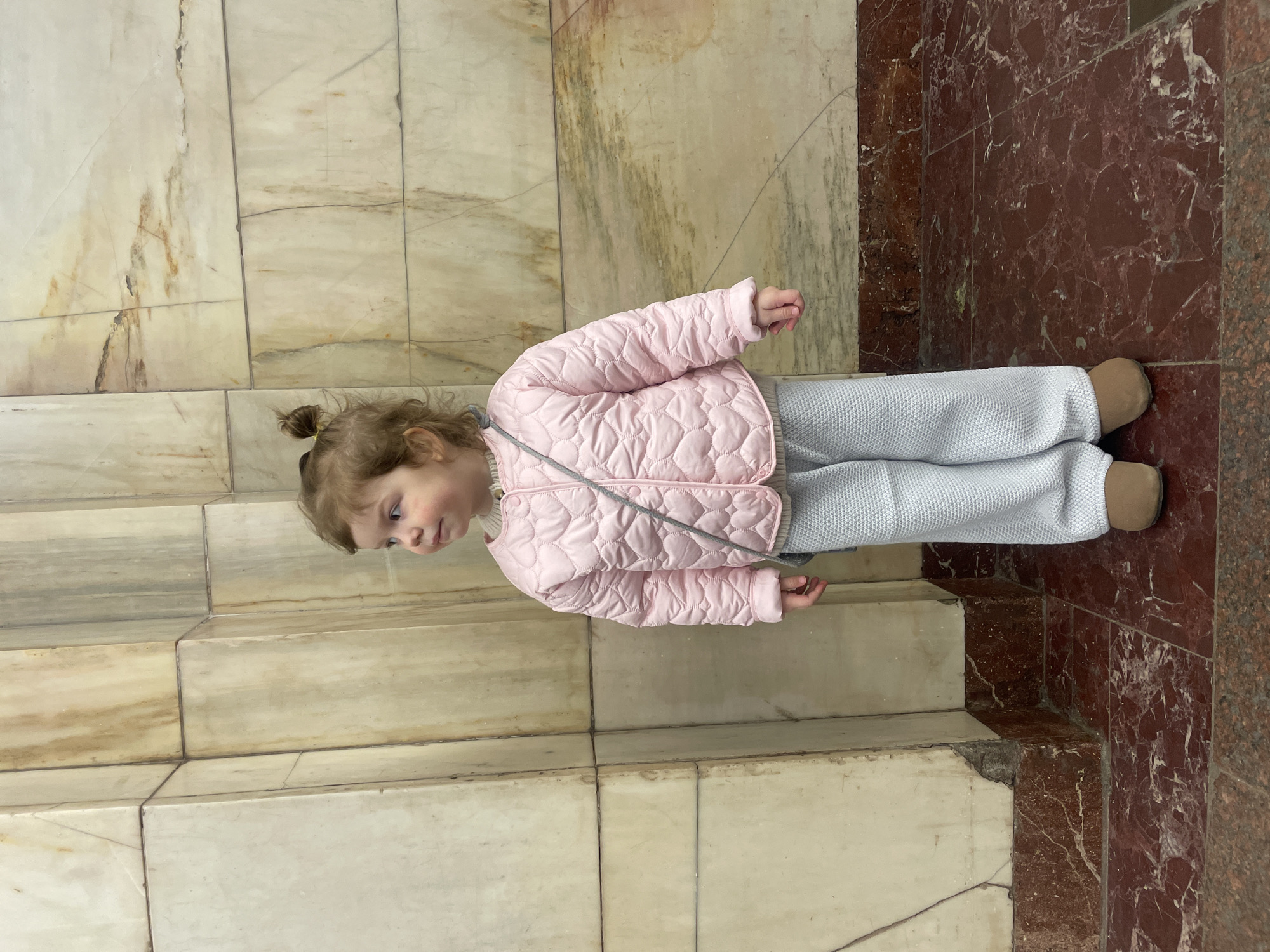 Child visits Lenin's Mausoleum in Moscow during morning hours