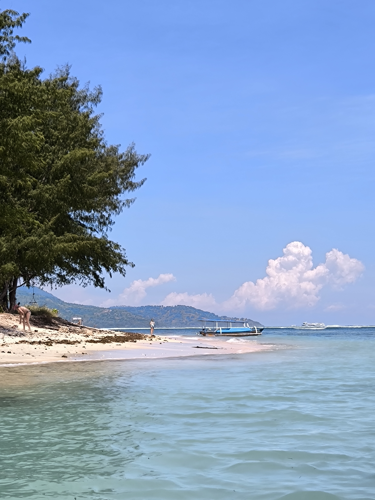 Sunny beach scene documented in Indonesia with clear skies