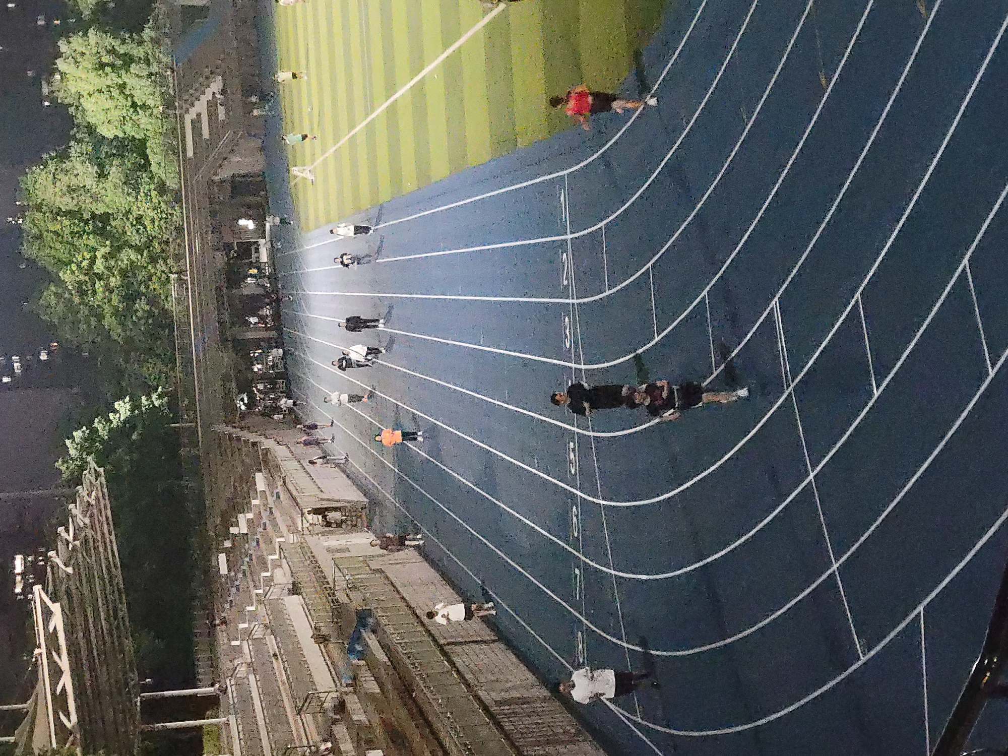 Night runners use athletic track in Shapingba District