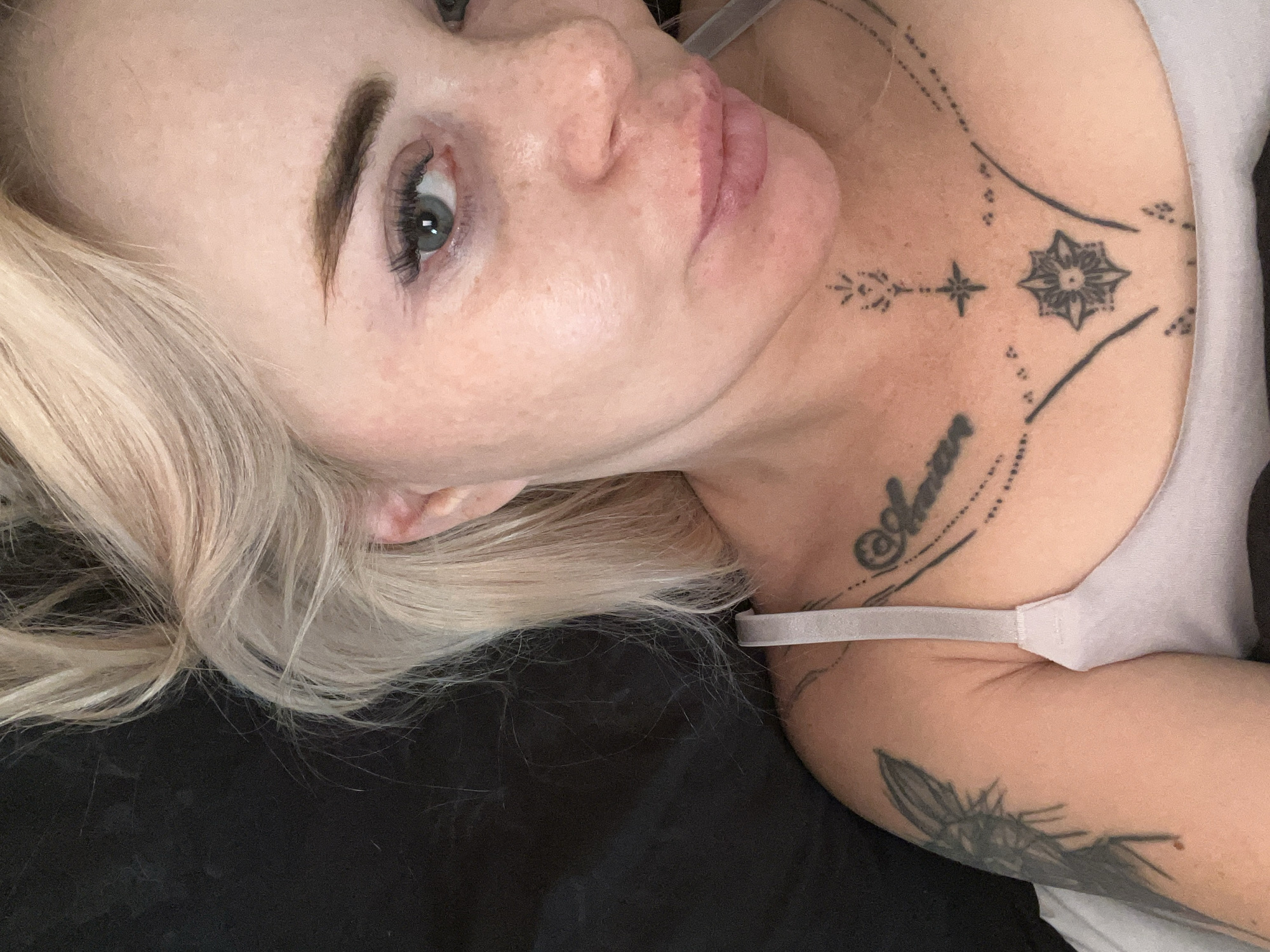 Bedroom selfie session, multiple angles, single sitting.