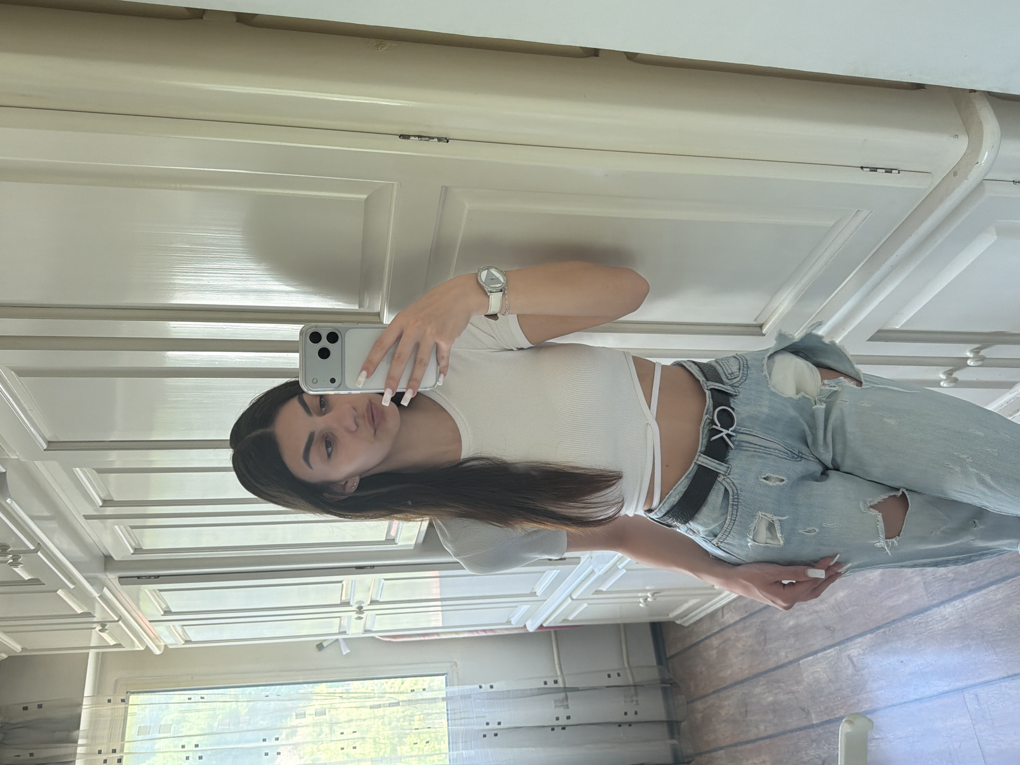 Woman Takes Morning Mirror Selfie in Gabrovo, Bulgaria