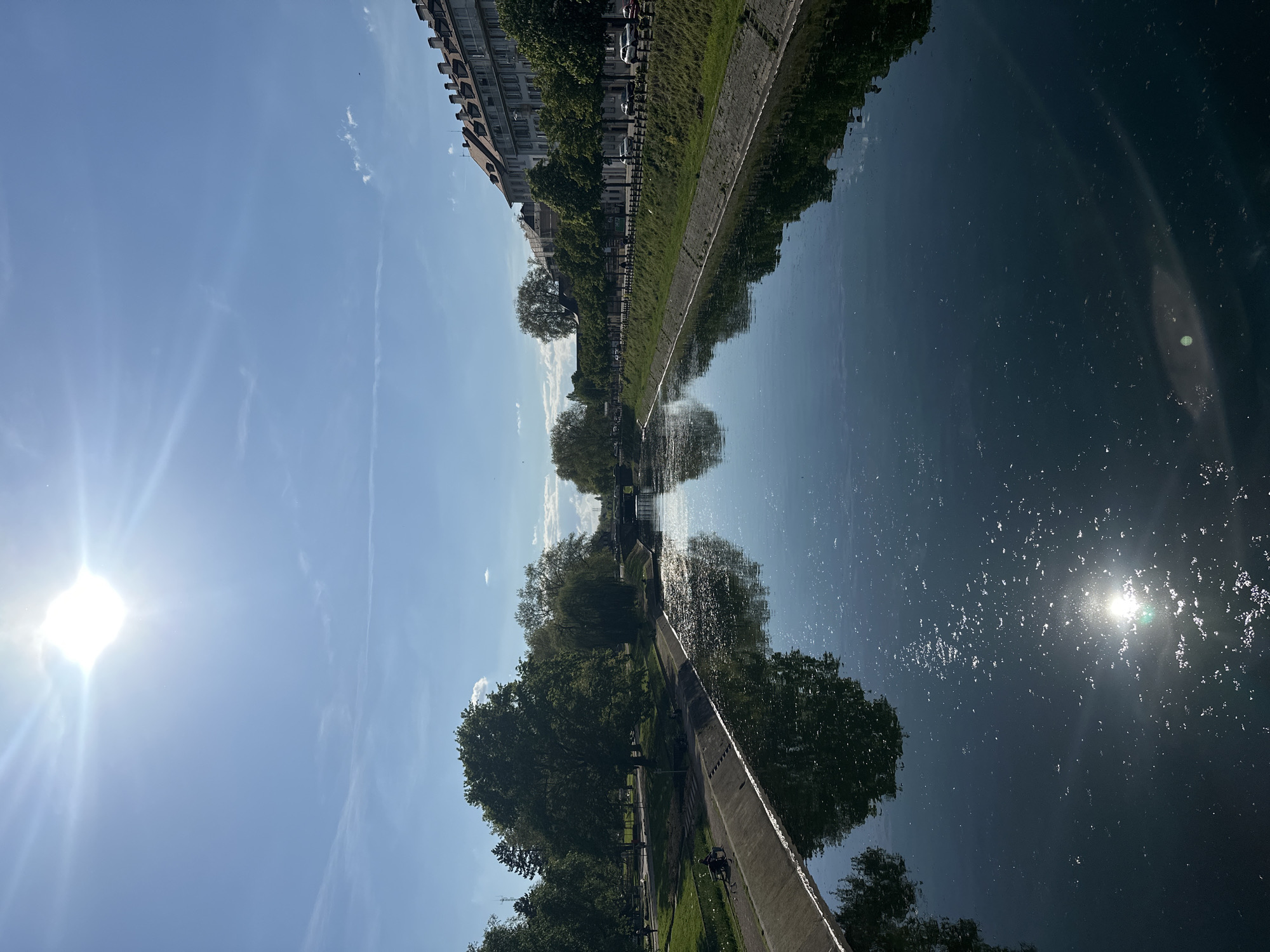 Sunny canal reflections documented in Strasbourg, France