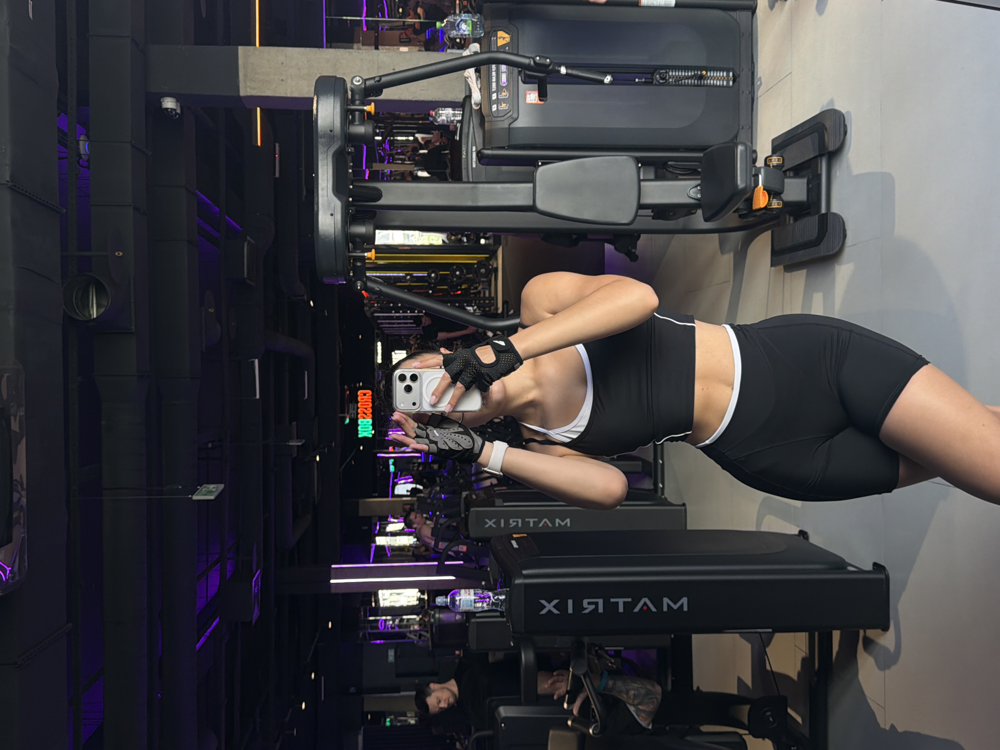 Woman documents workout session at Podolsk gym with selfies