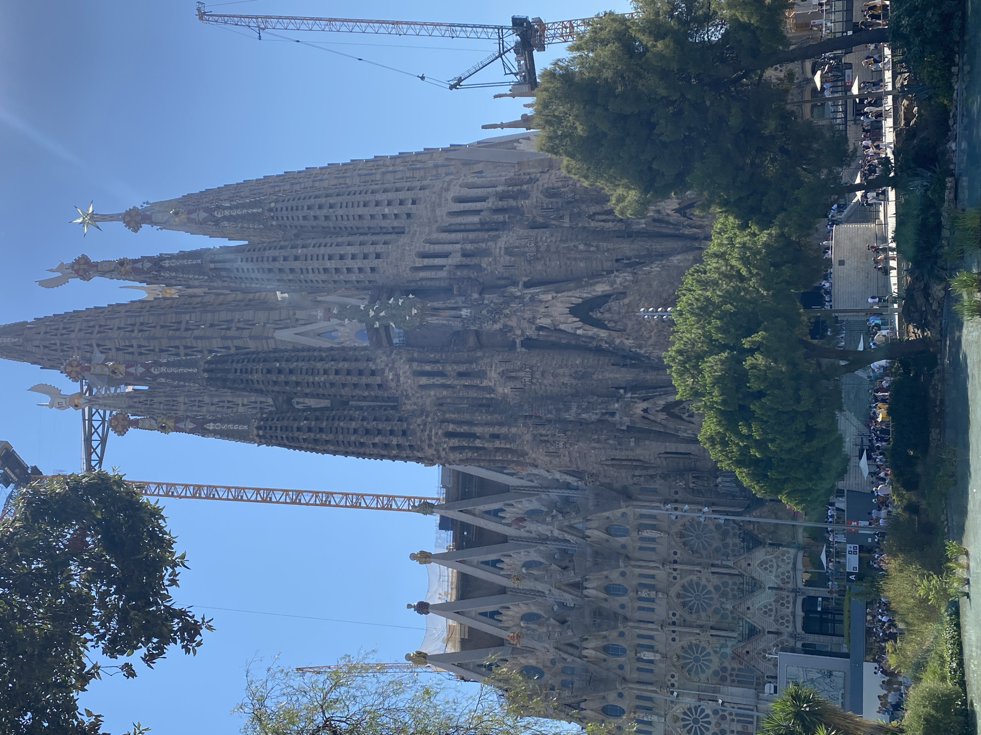 Sagrada Família from multiple angles on a clear summer day