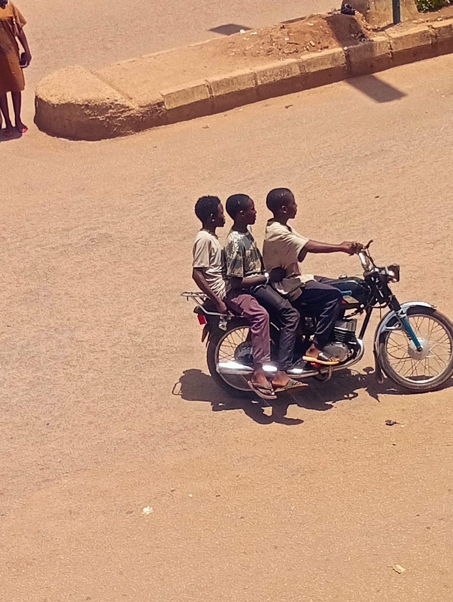 Ordinary street life documented in unknown urban location