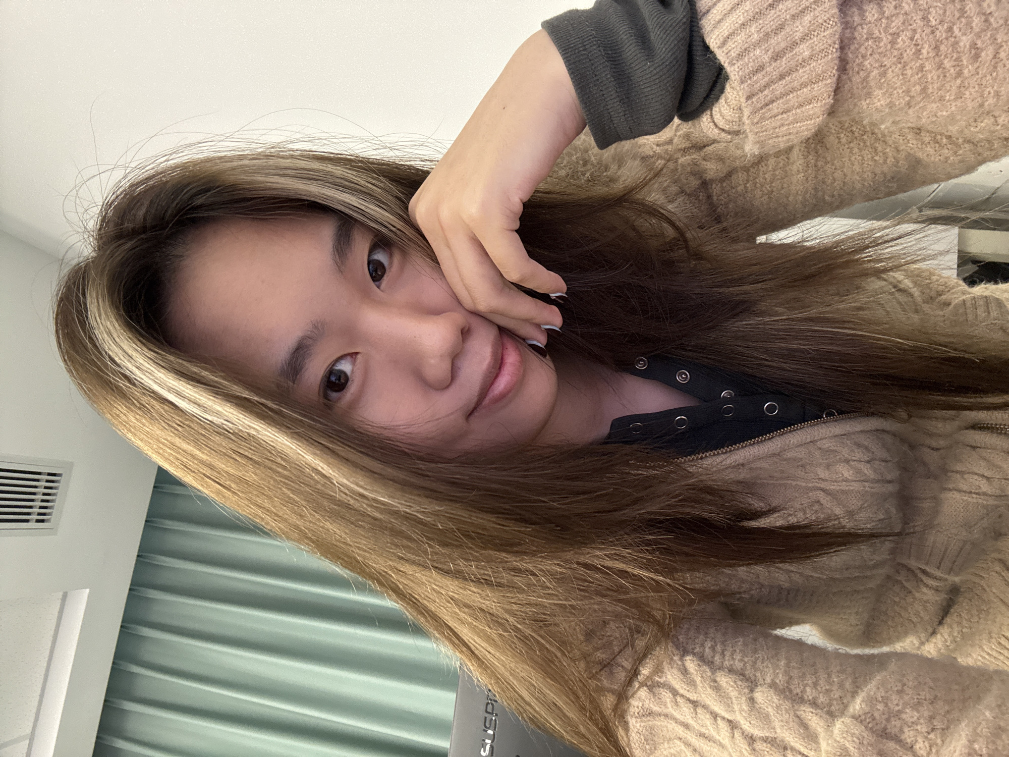 Student takes selfies in computer lab classroom
