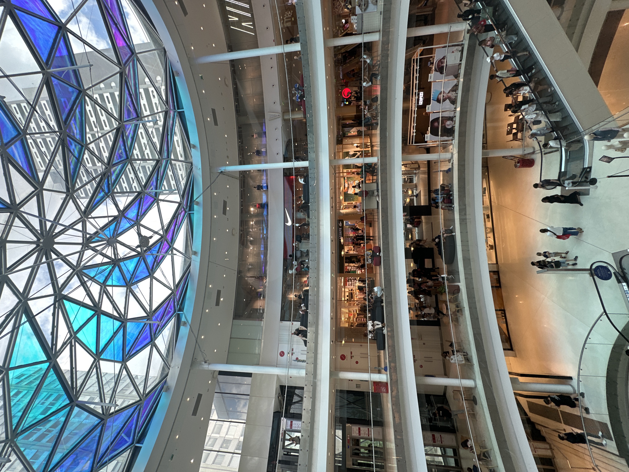 Paris mall's geodesic stained-glass dome from multiple angles