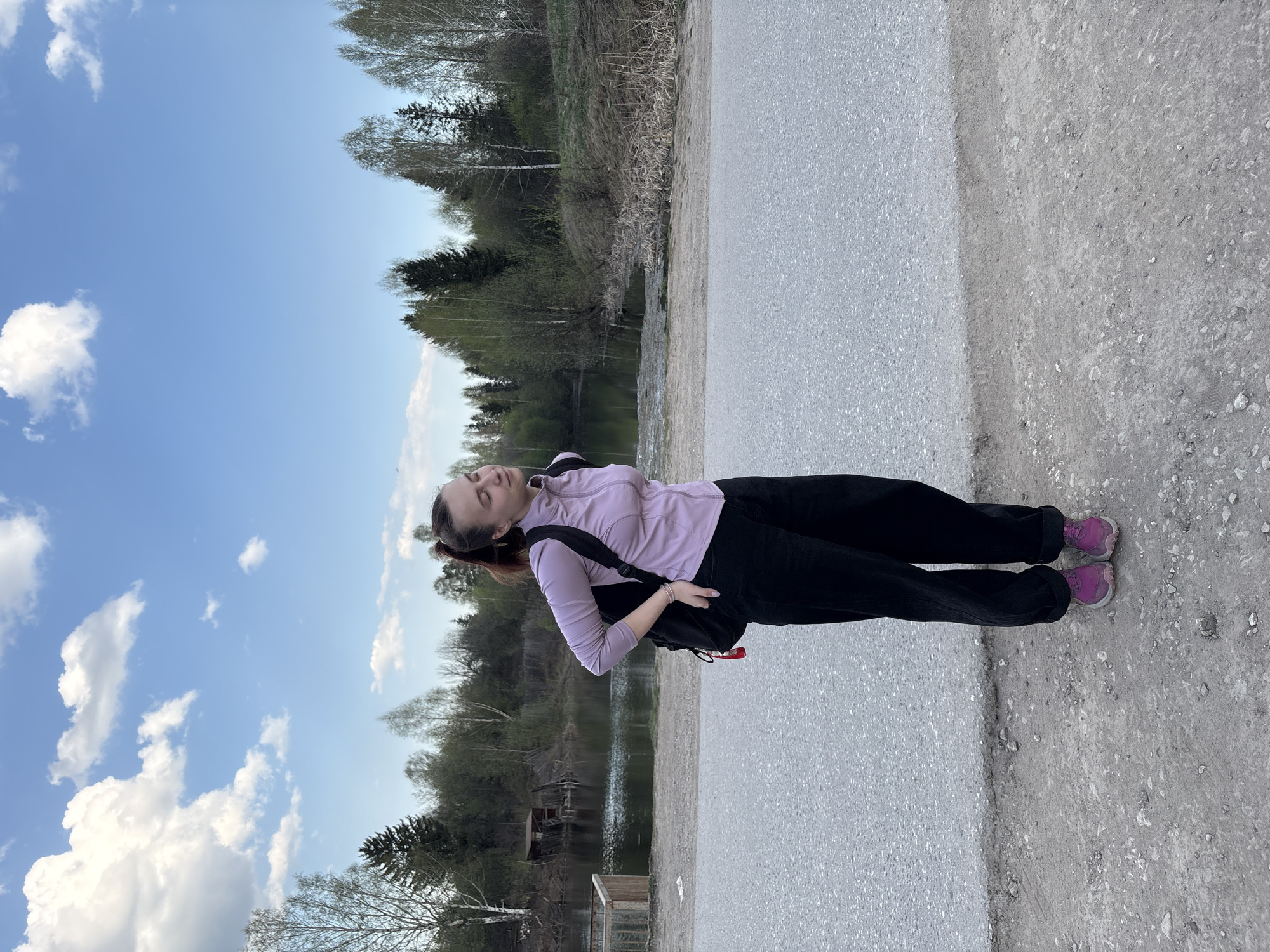 Woman walks through Perm, Russia during afternoon outing