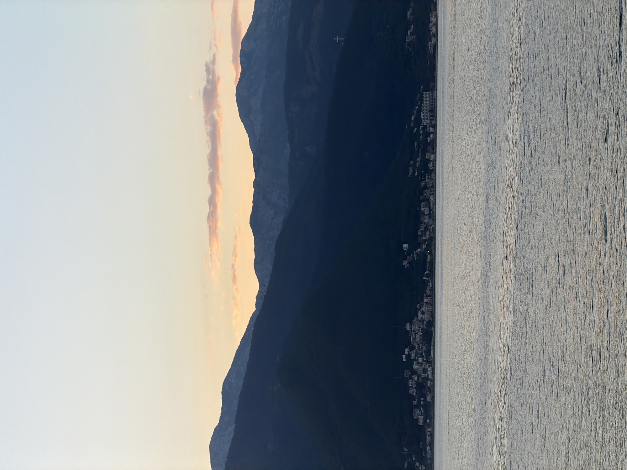 Sunset coastal views captured in Gošići, Montenegro terrace moment