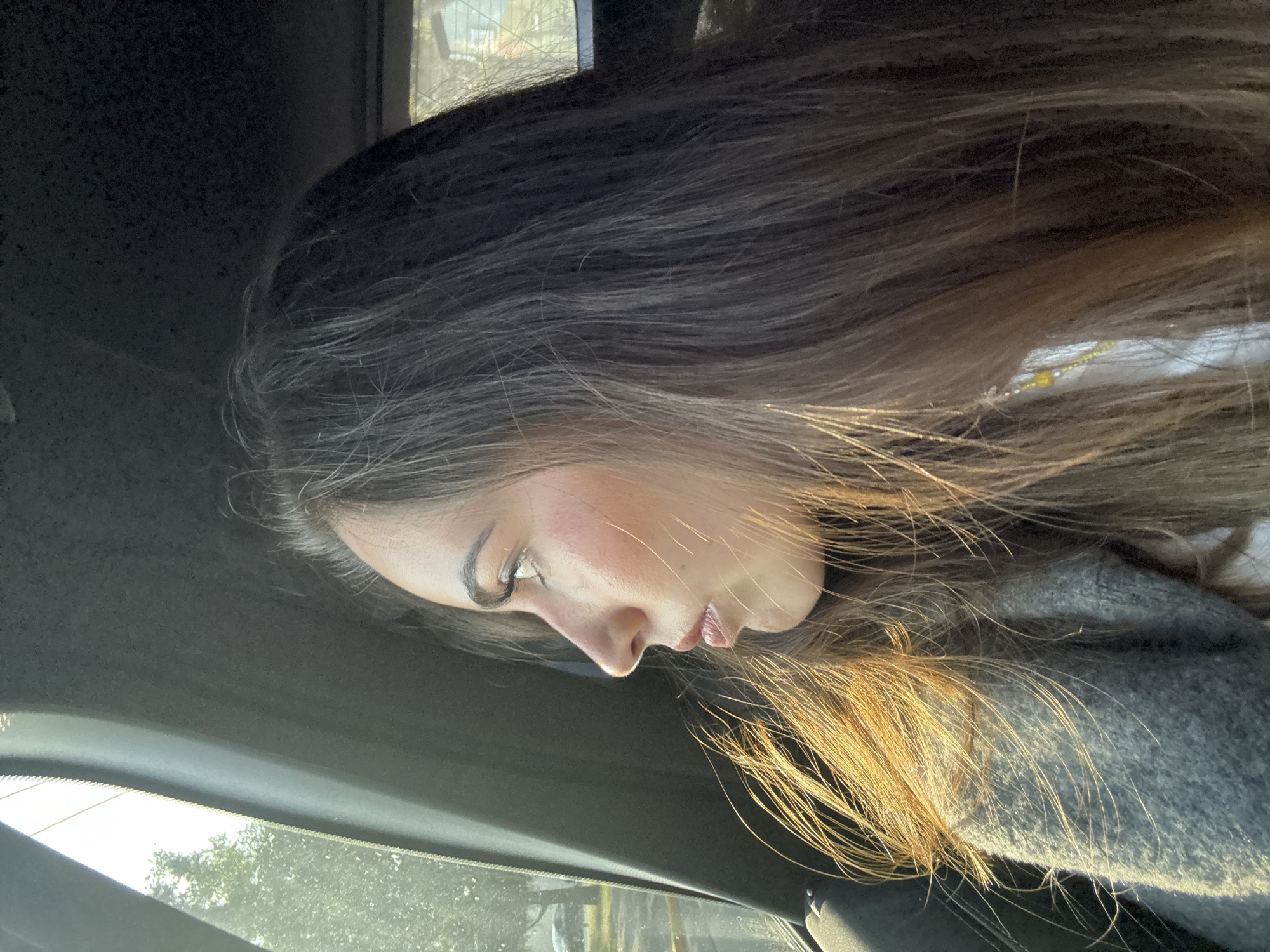 Woman photographed during late night car journey in Puebla