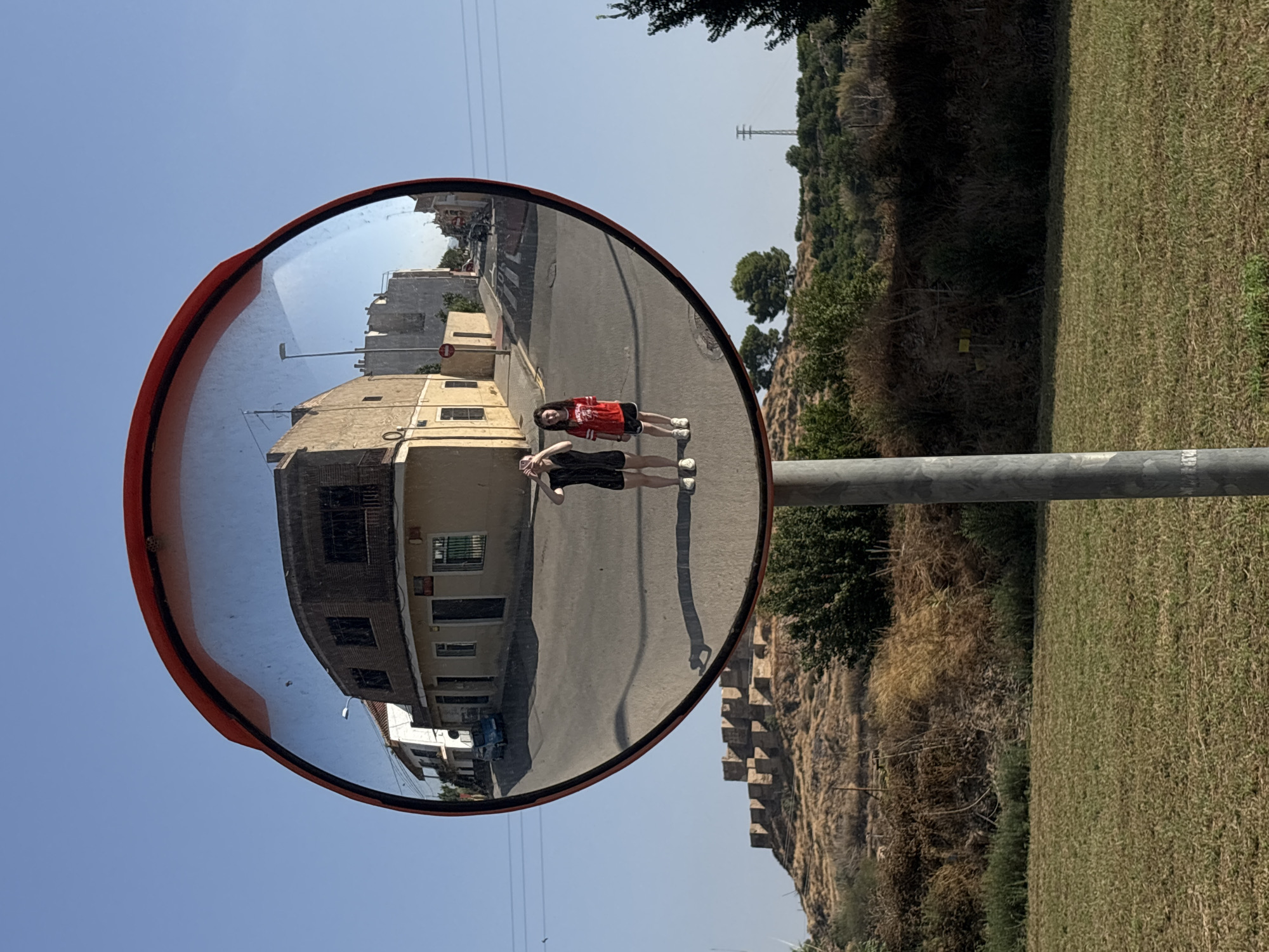 Monteagudo street scenes with the hilltop Christ statue above
