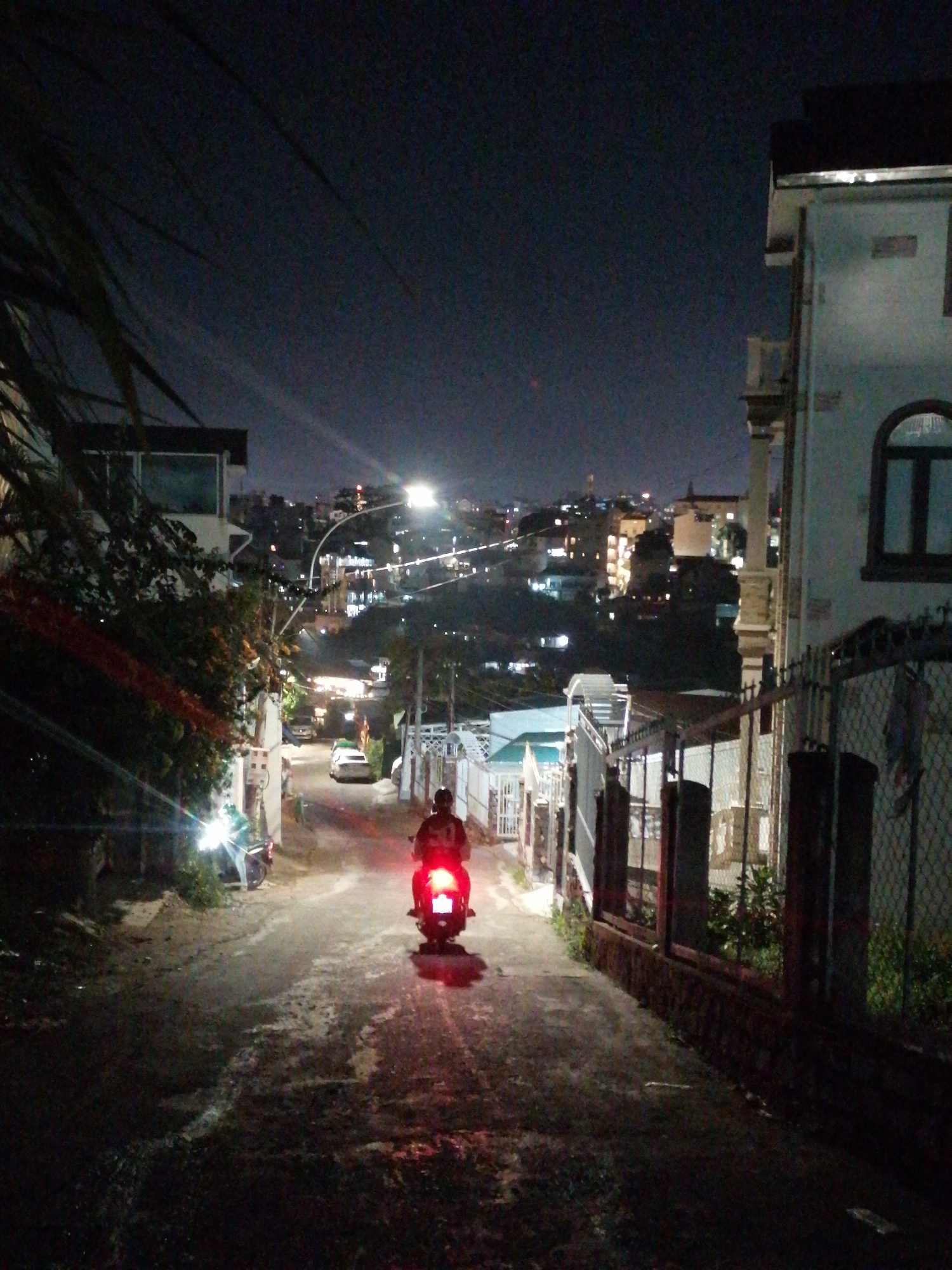 Nighttime scenes documented across Da Lat, Vietnam temples and streets