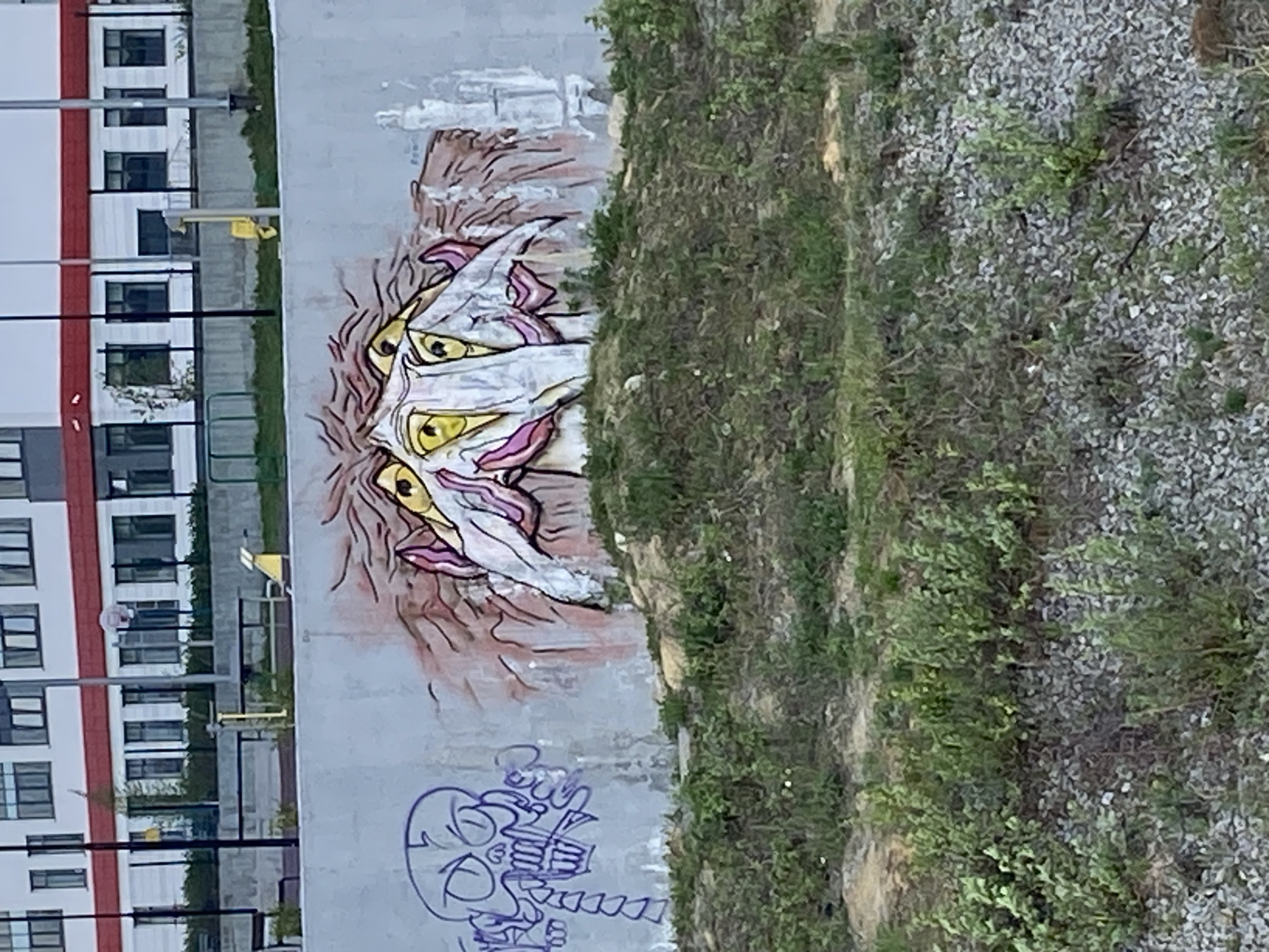 Spring day documented through Yekaterinburg street art and blooming trees