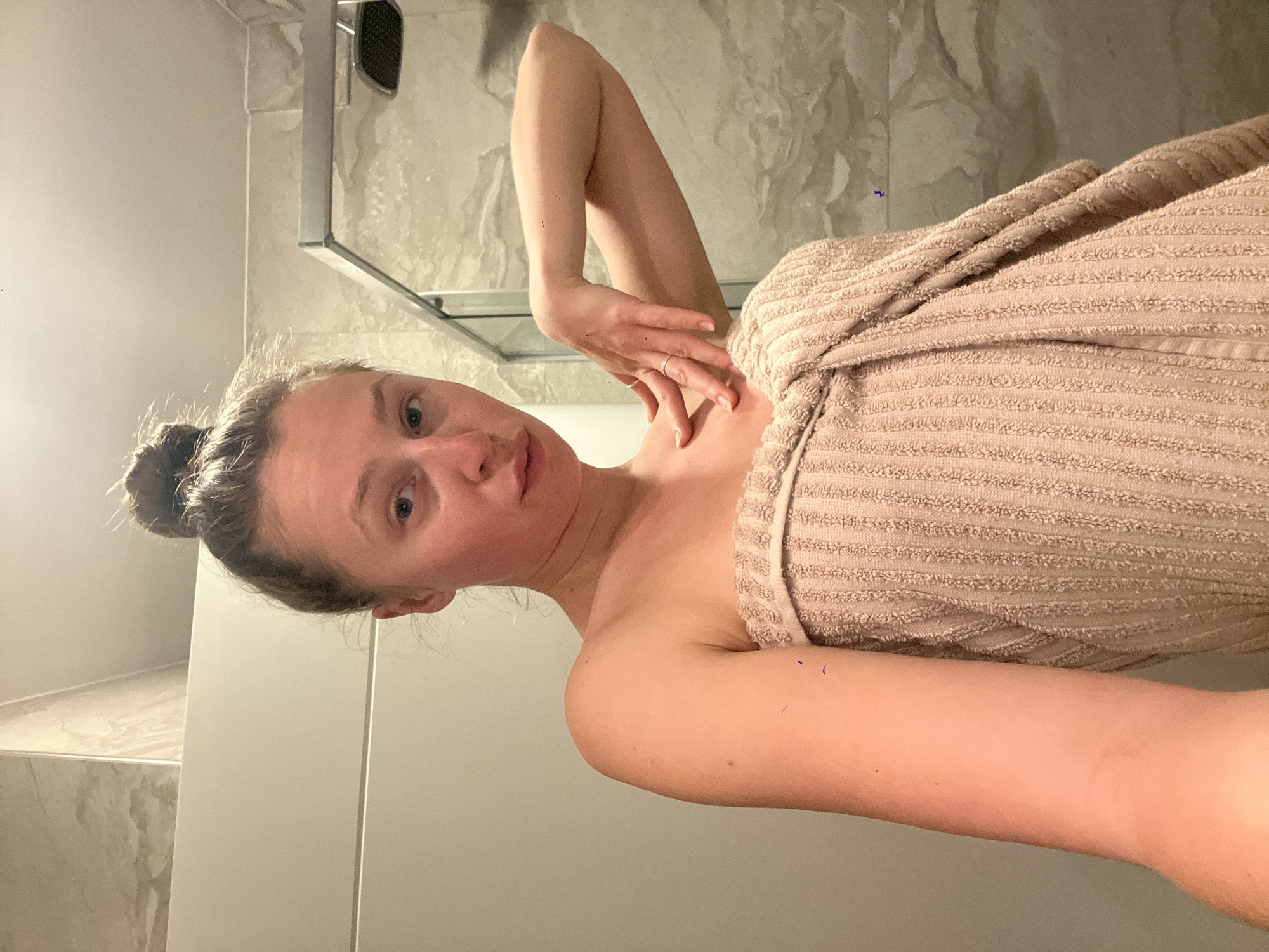 Woman observed in bathroom during morning routine in Montenegro