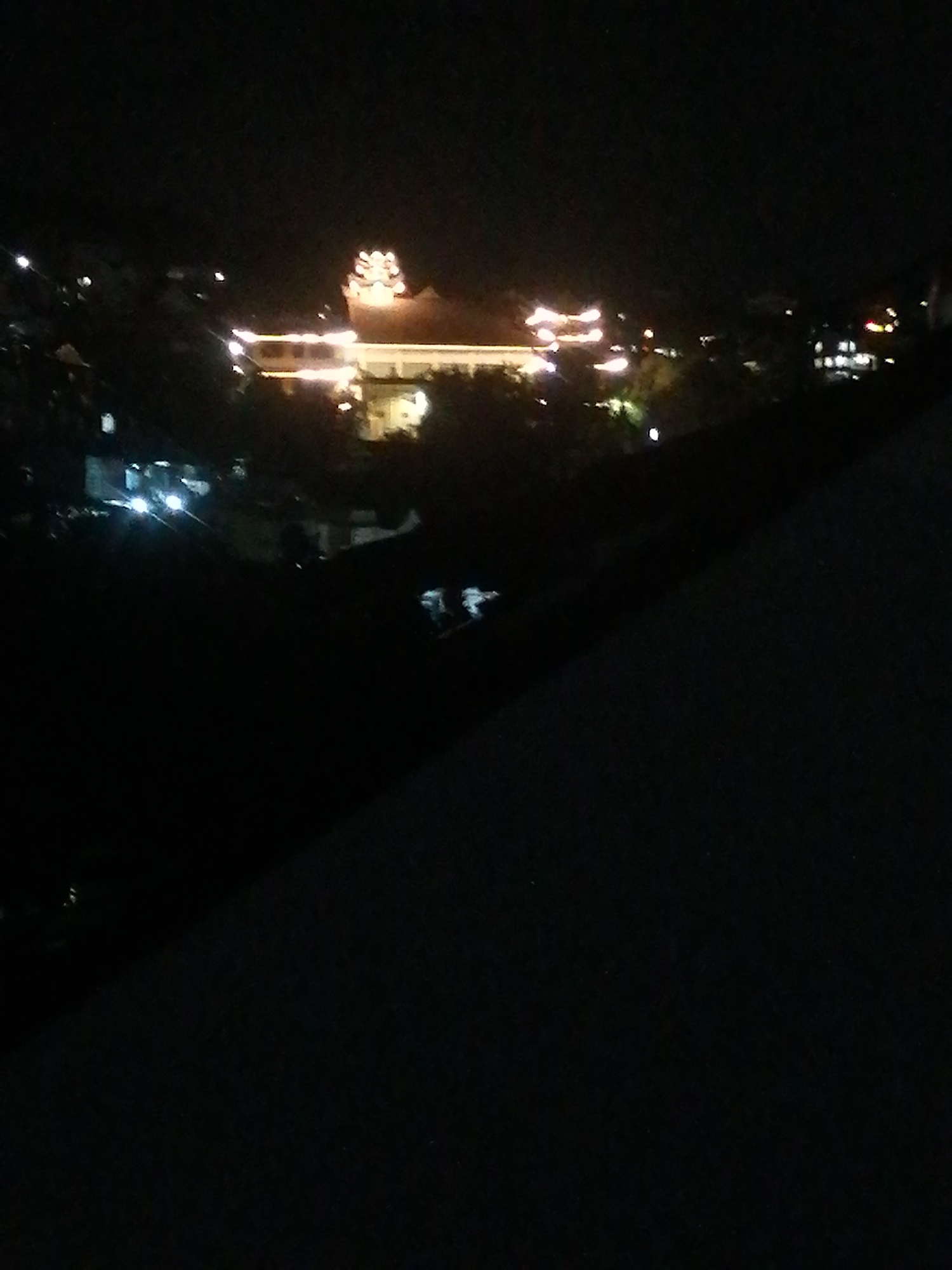 Da Lat nights: city lights, hillside views, and fresh mango