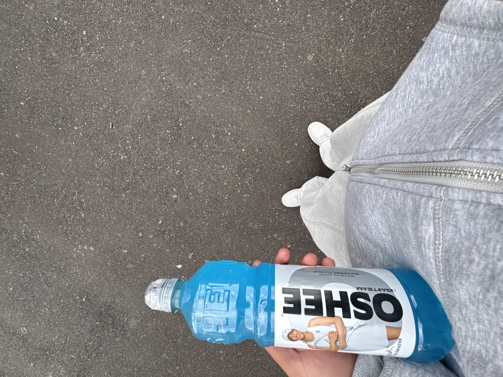 Person spotted with OSHEE drinks, Nike sneakers in Yerevan