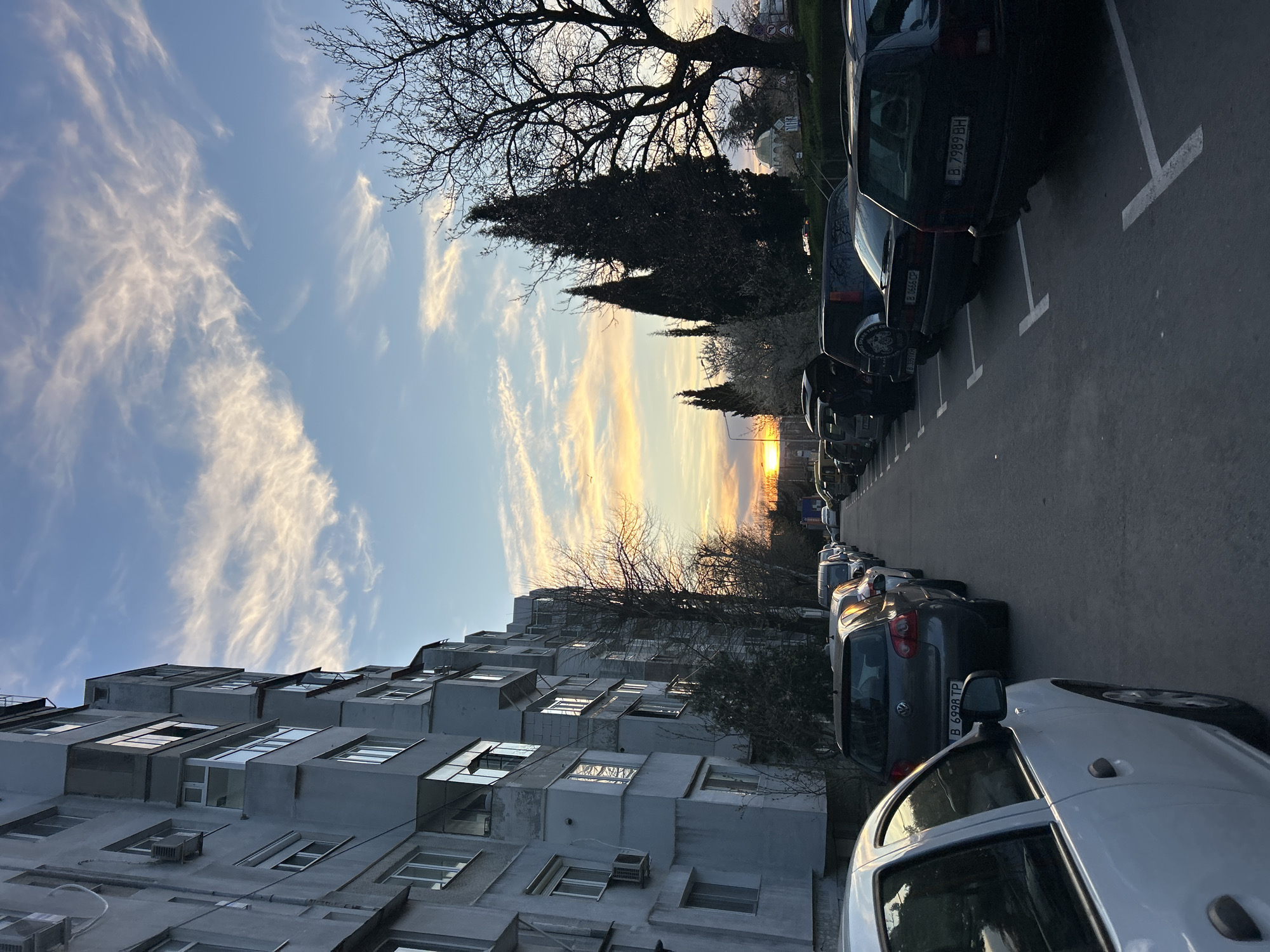 Evening parking scene captured on Varna street at sunset
