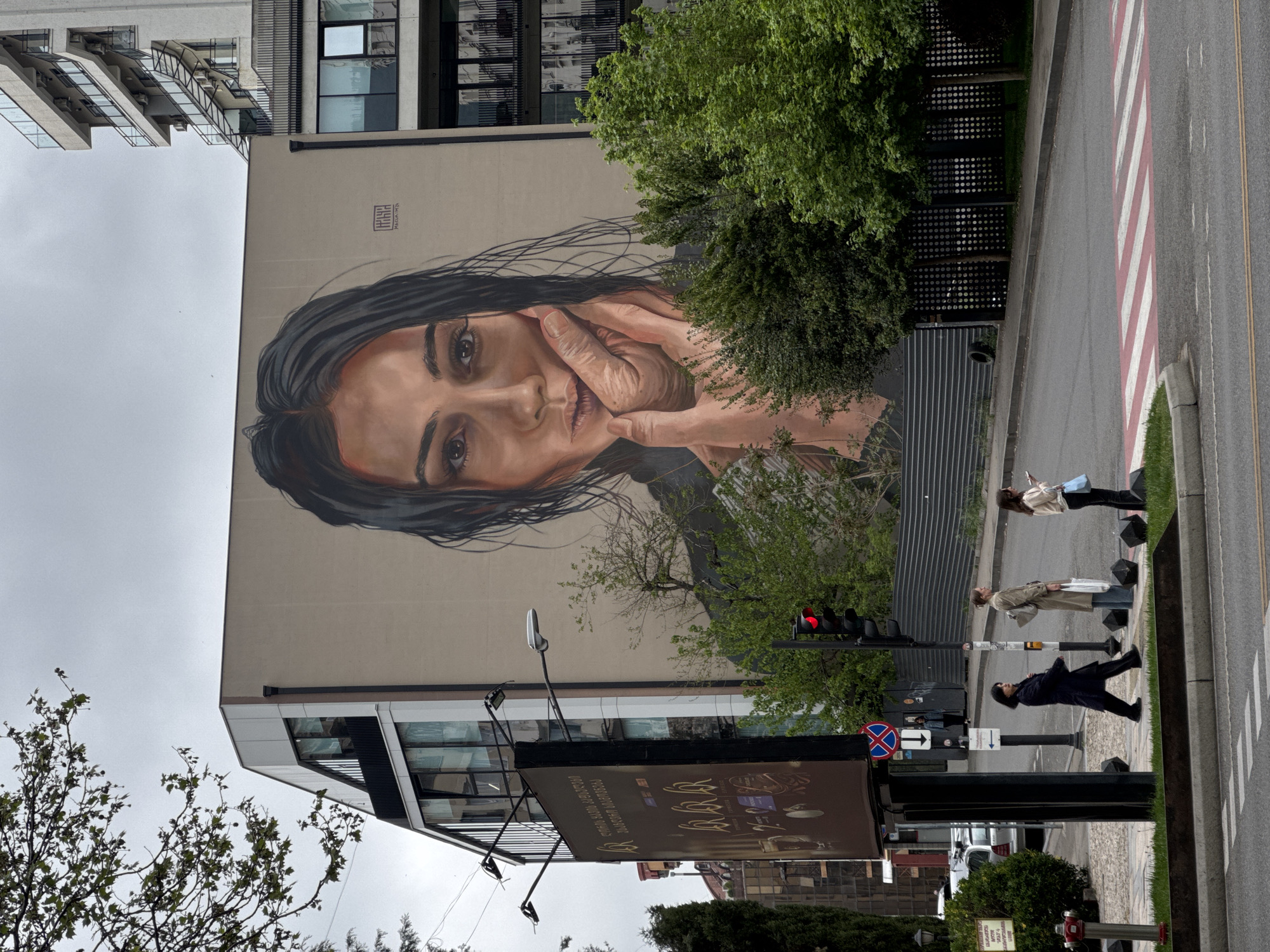Woman documents casual walk through downtown Tbilisi streets