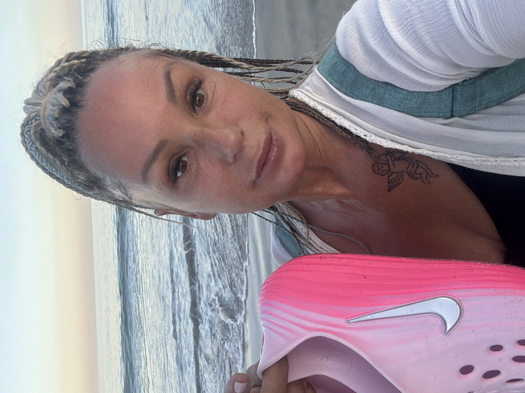 Woman takes selfie on Kuta Selatan beach