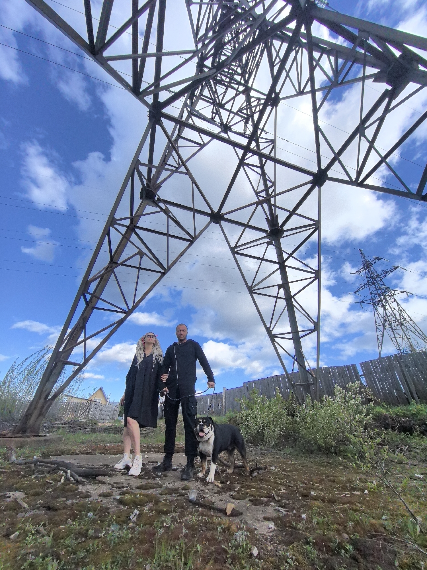 Couple with dog photographed near transmission towers in Noviy