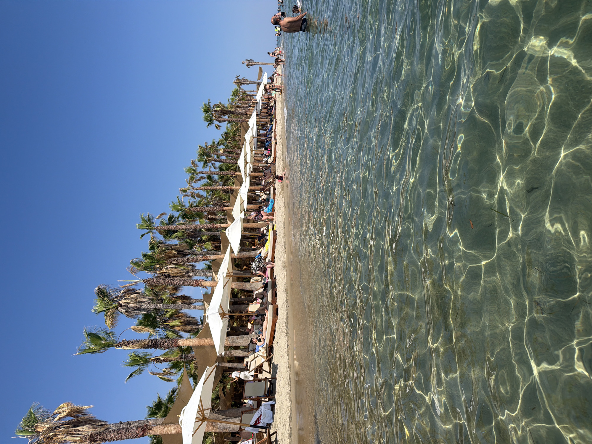 Clear skies and calm Aegean water at Keramoti beach