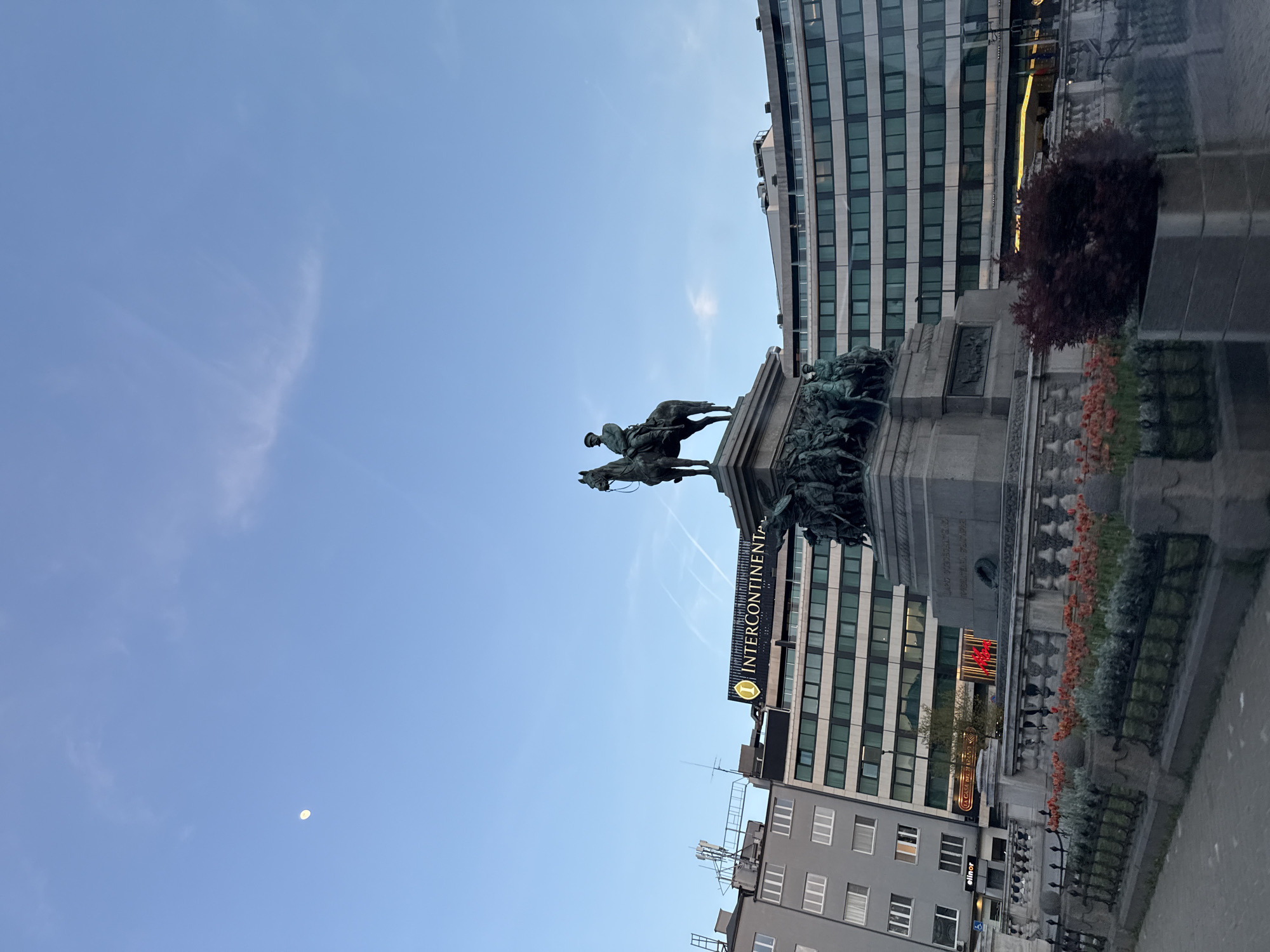 Tourist captures Sofia landmarks including university and equestrian statue