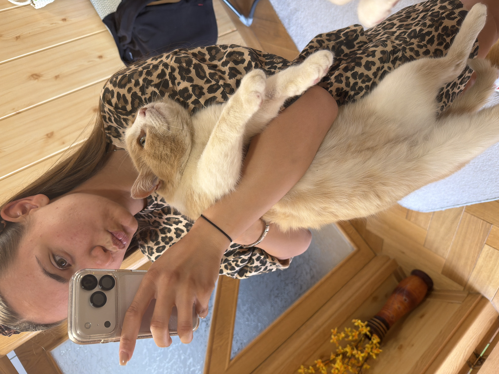 Woman takes selfies with cat in Buhovo home