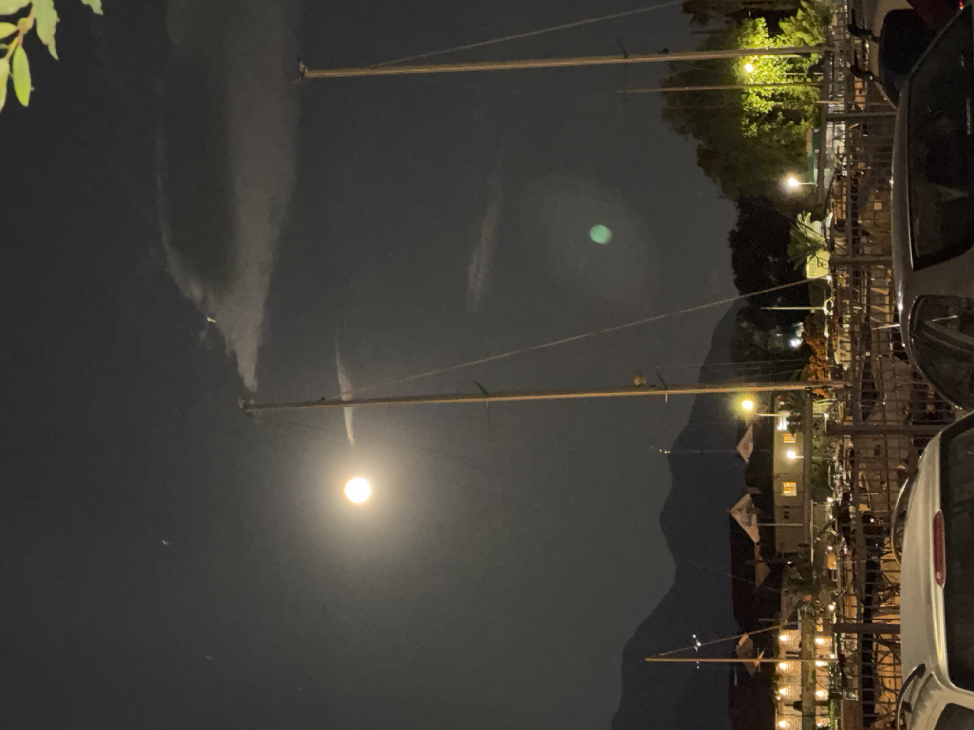 Bright moon illuminates Tivat waterfront on spring evening