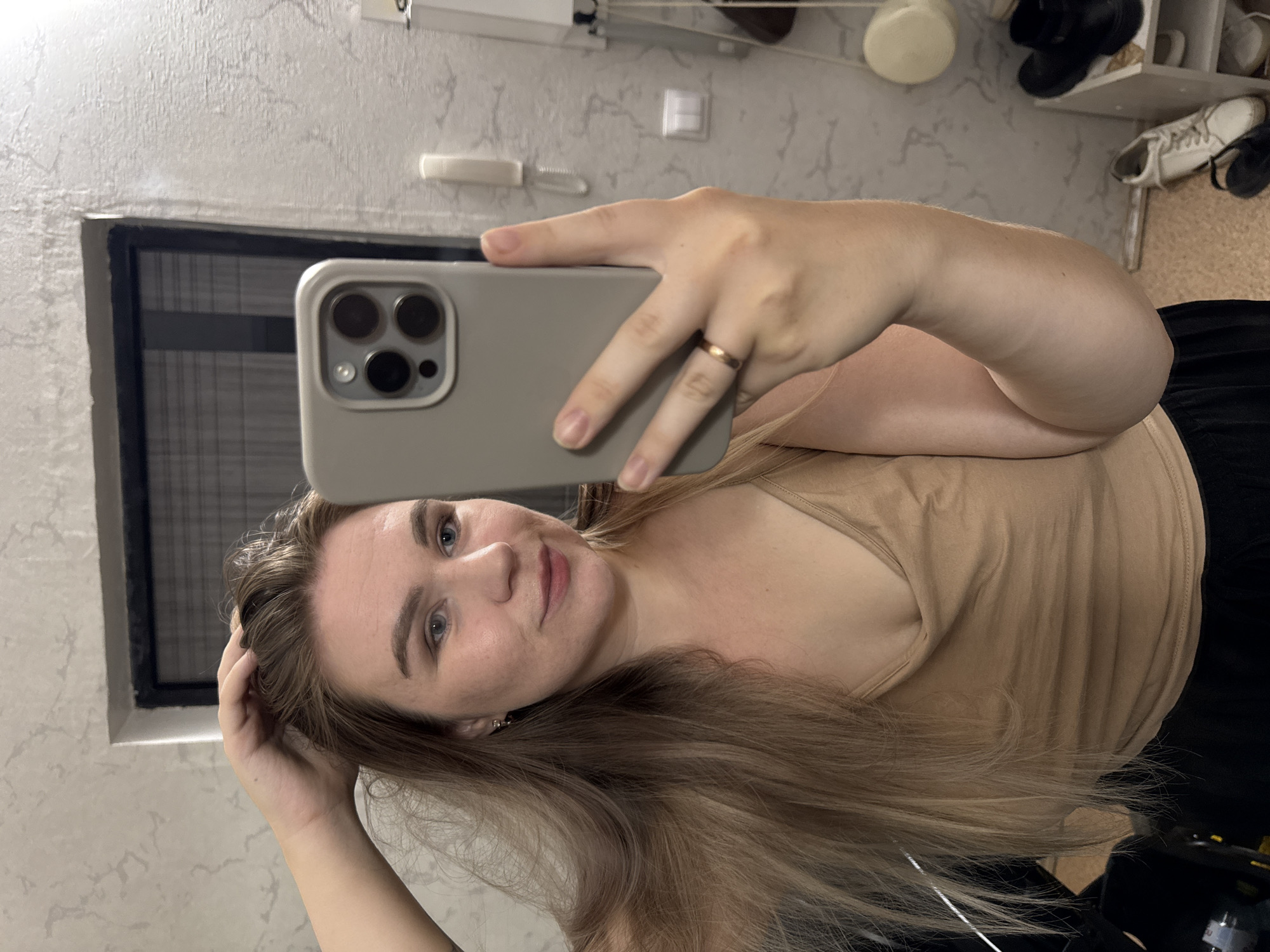 Woman captures selfies, roses during afternoon in Chaikovsky, Russia