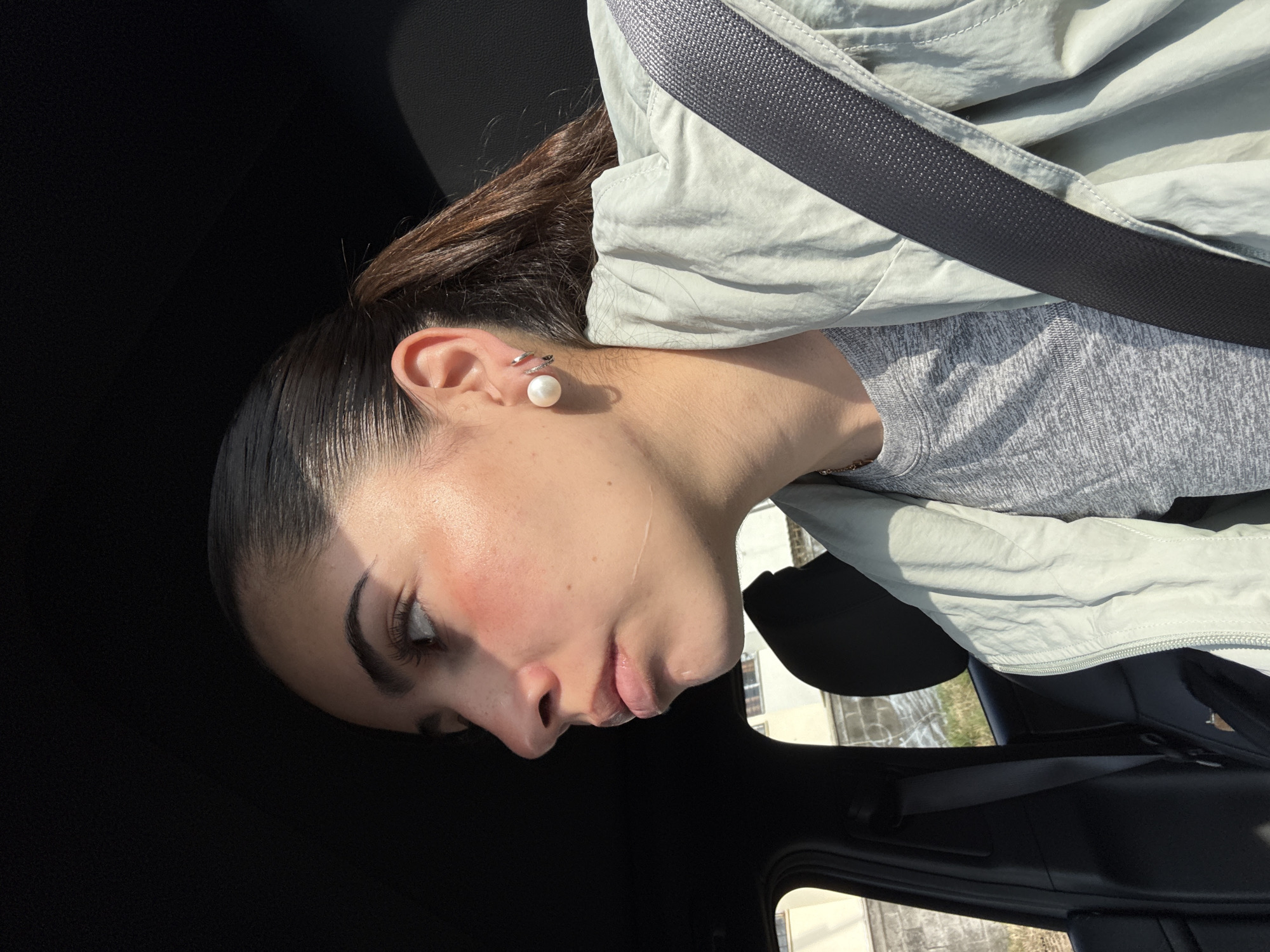 Person photographed in vehicle during daytime in Tlaxcalancingo, Mexico