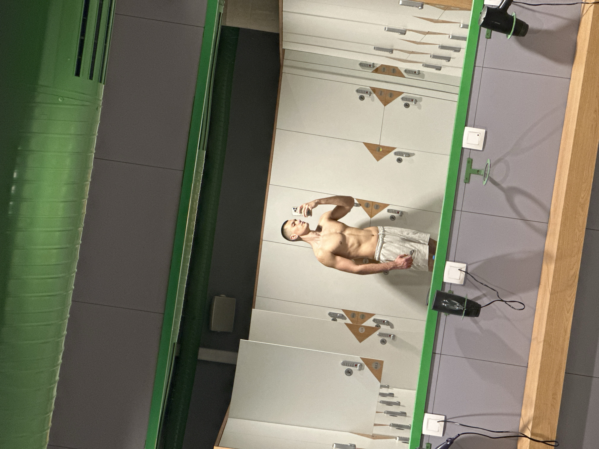 Person takes selfies in Sofia locker room facility
