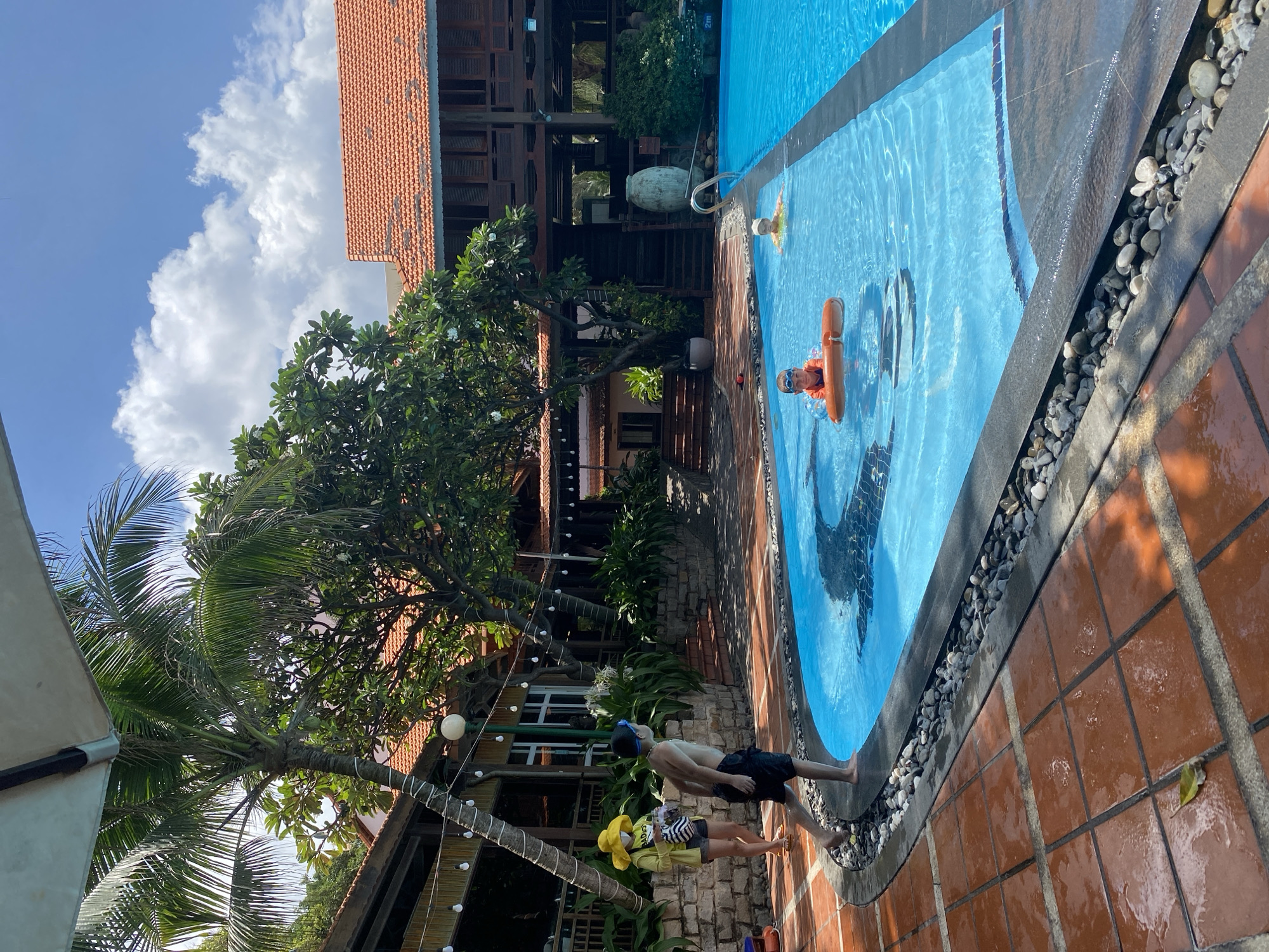 Families enjoy pool and beach time at Vietnam resort