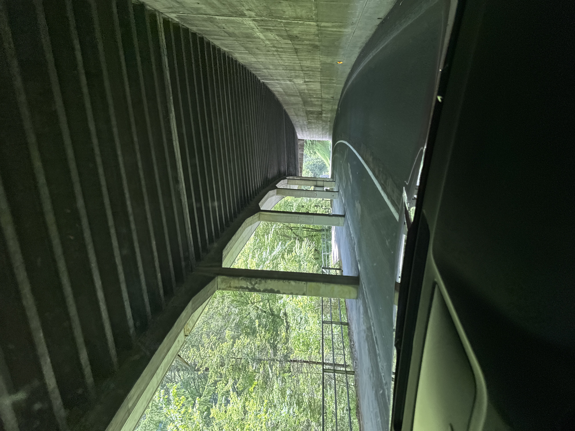 Vehicle travels through concrete tunnel in Ferlach, Austria